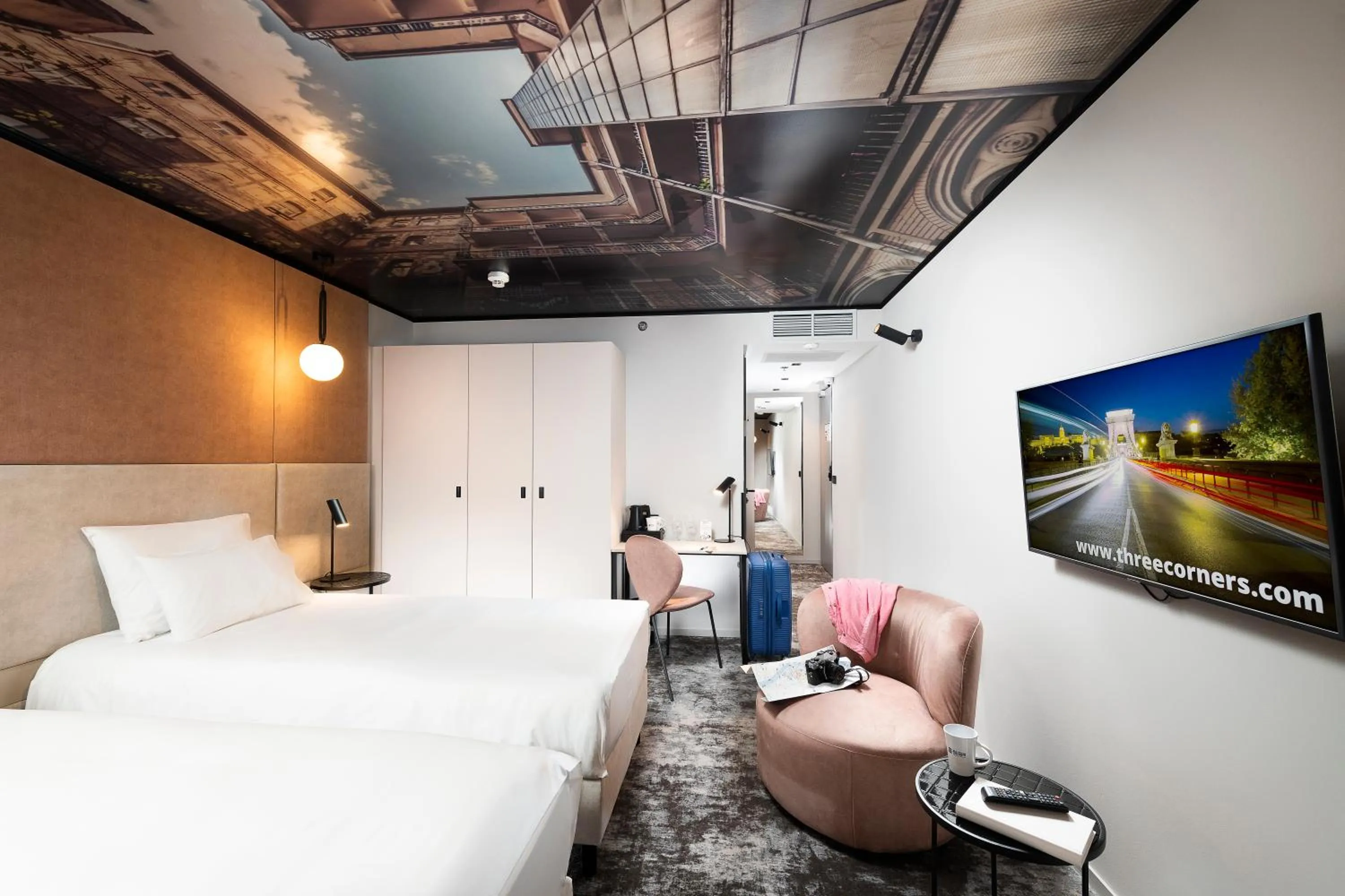 Bed in Three Corners Downtown Hotel