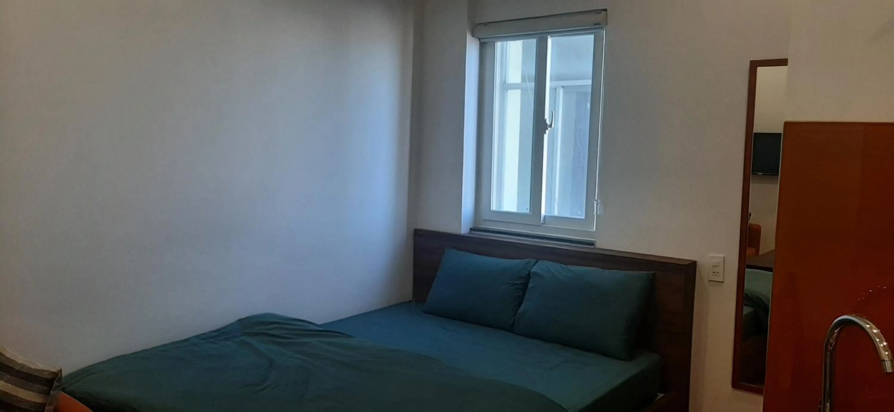 Bedroom in OYO 1161 Puchin Hotel And Apartment