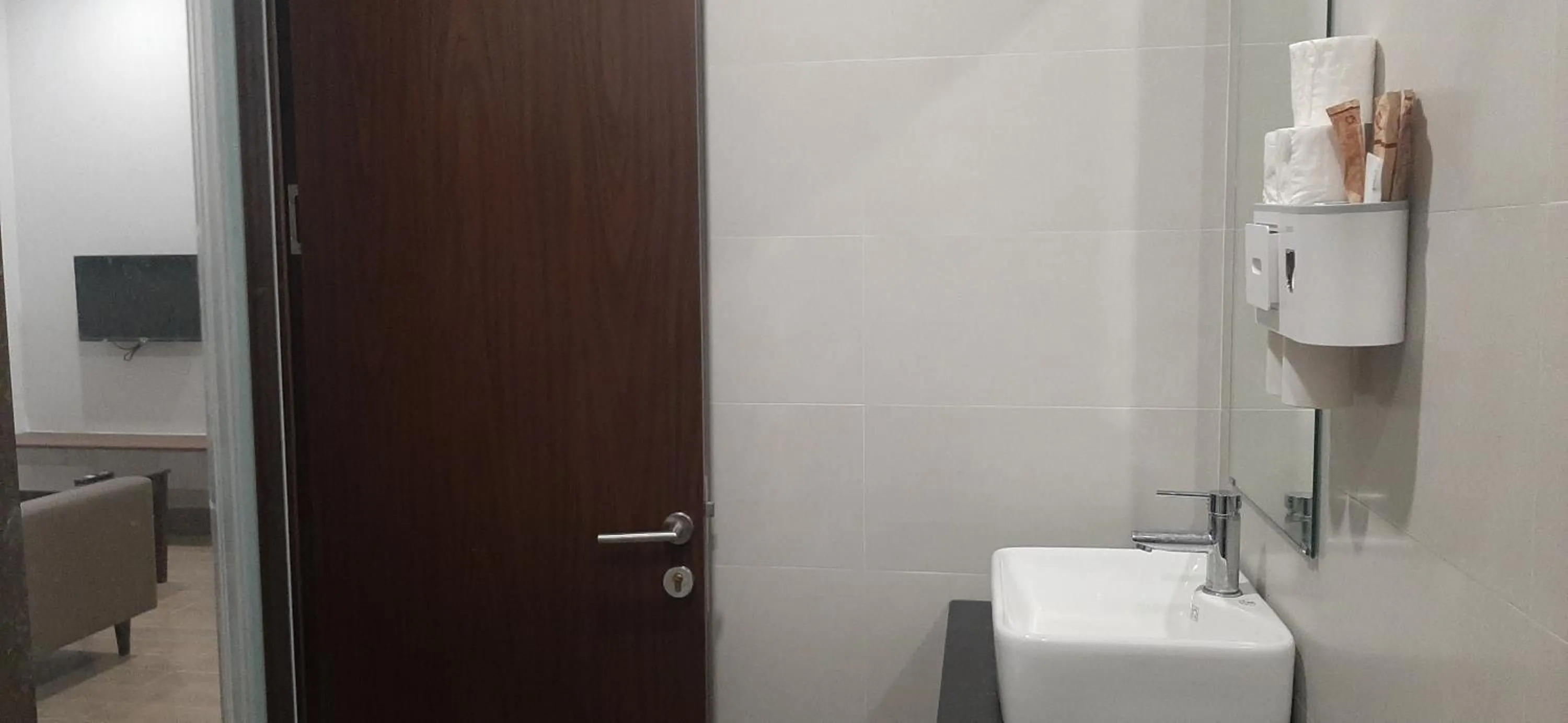 Bathroom in OYO 1161 Puchin Hotel And Apartment