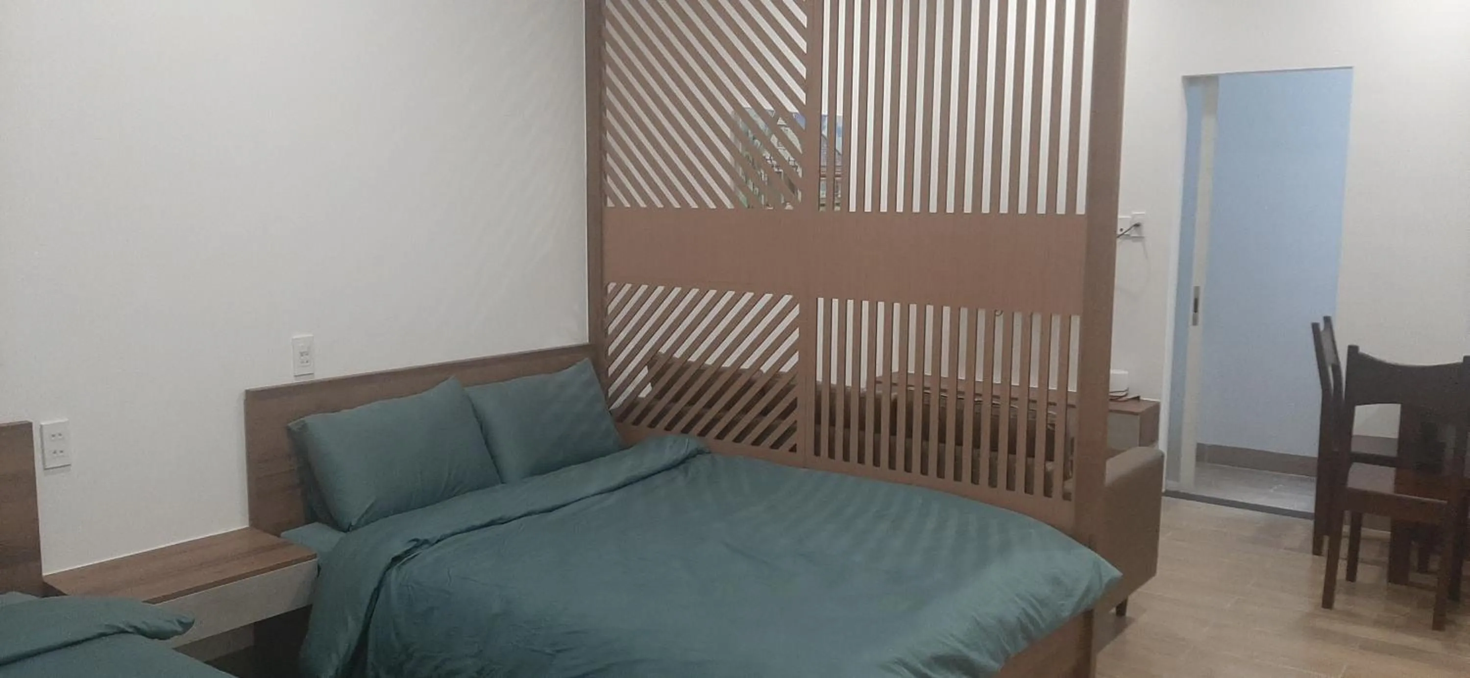 Bedroom in OYO 1161 Puchin Hotel And Apartment