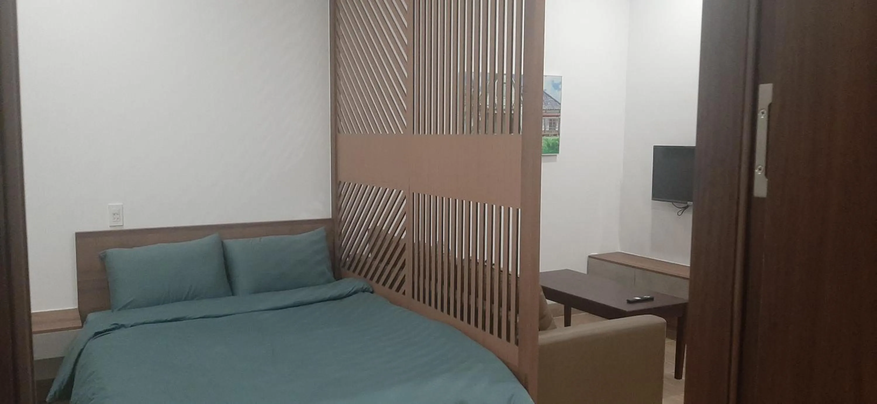 Bedroom in OYO 1161 Puchin Hotel And Apartment