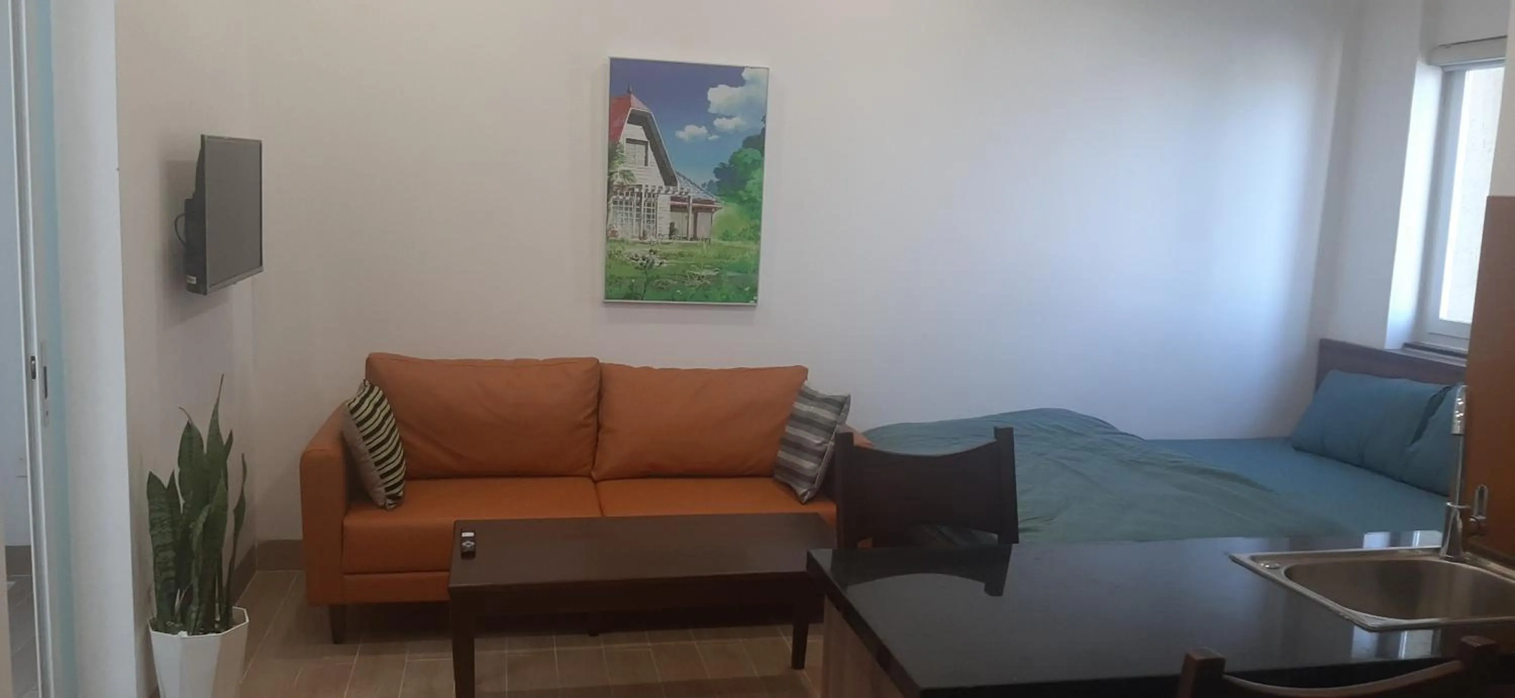 Bedroom in OYO 1161 Puchin Hotel And Apartment