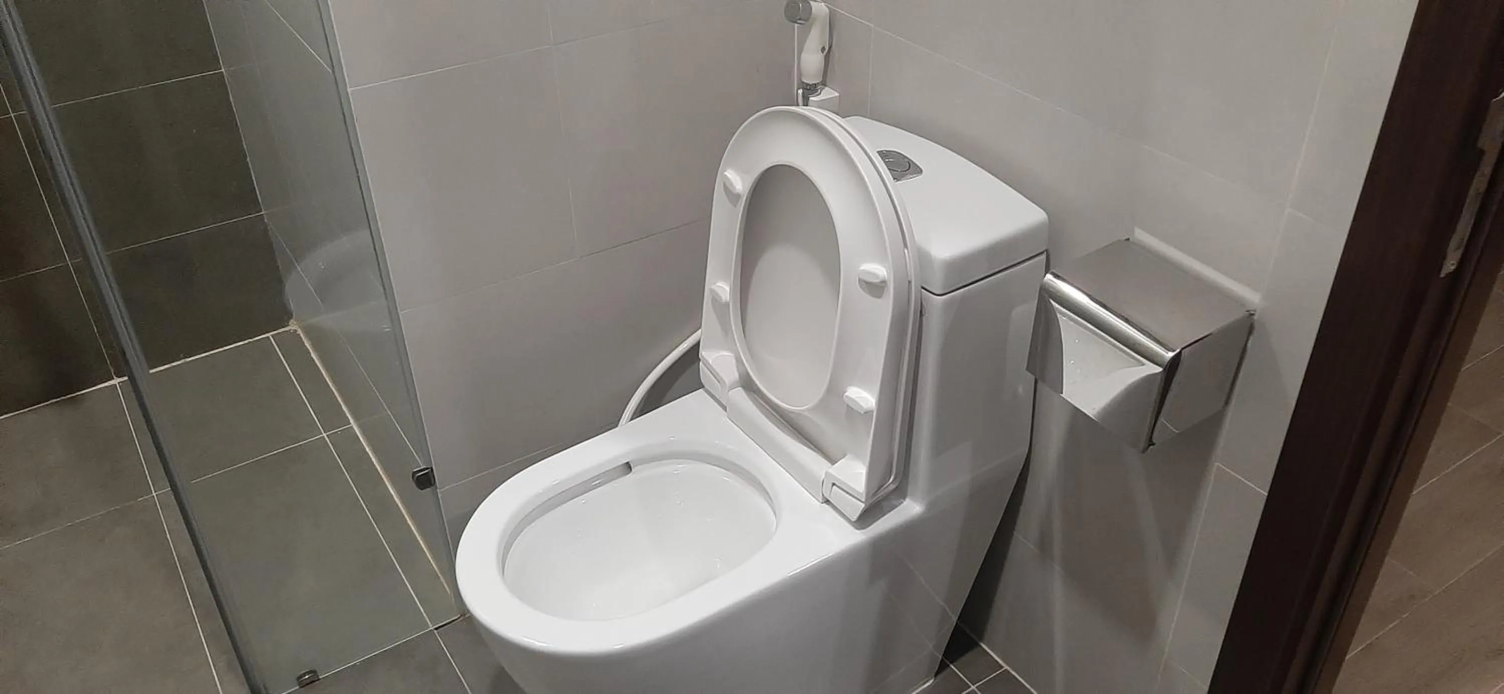 Bathroom in OYO 1161 Puchin Hotel And Apartment