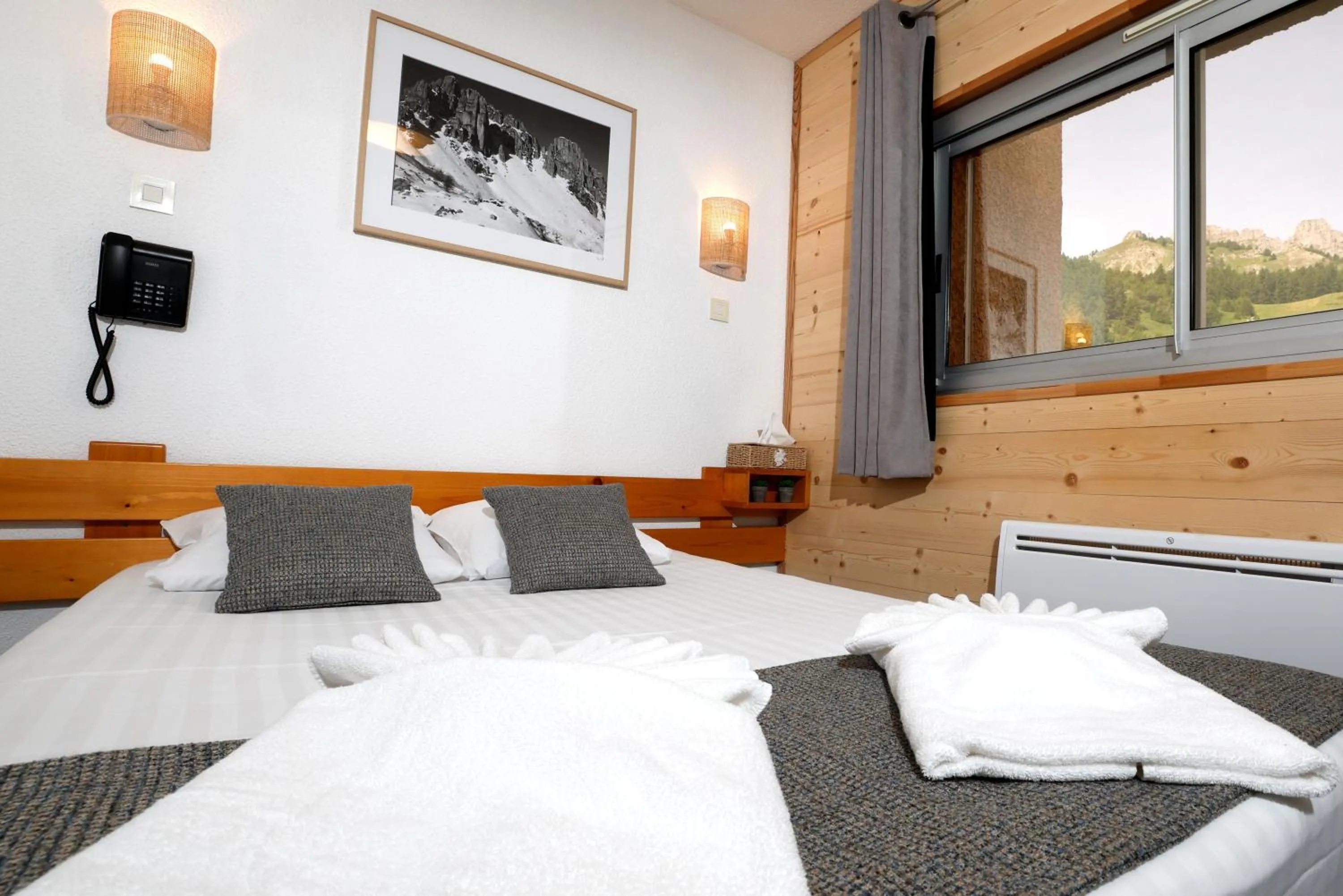 Bed in Le Balcon des Ecrins