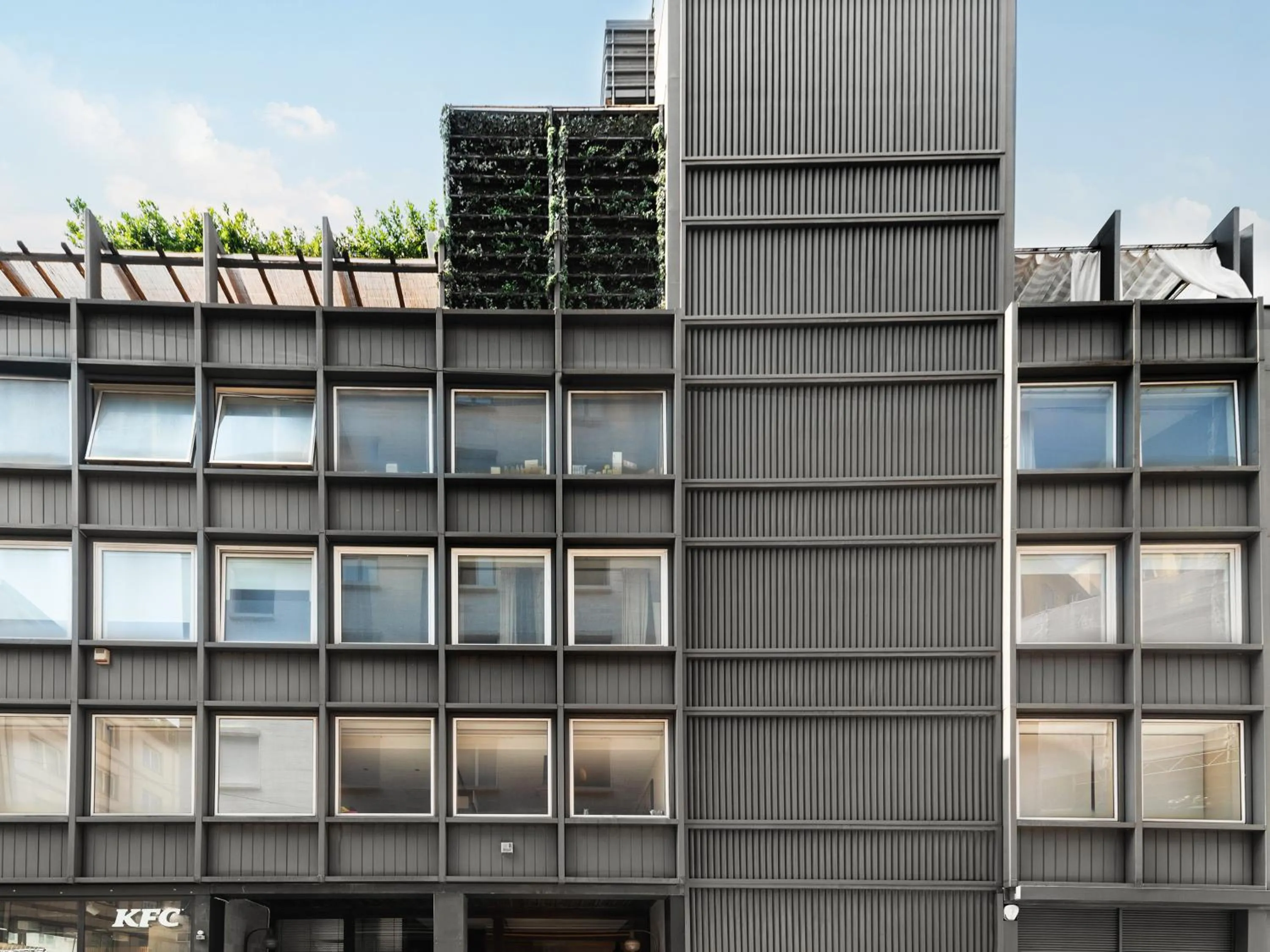 Property building in Milan Adore