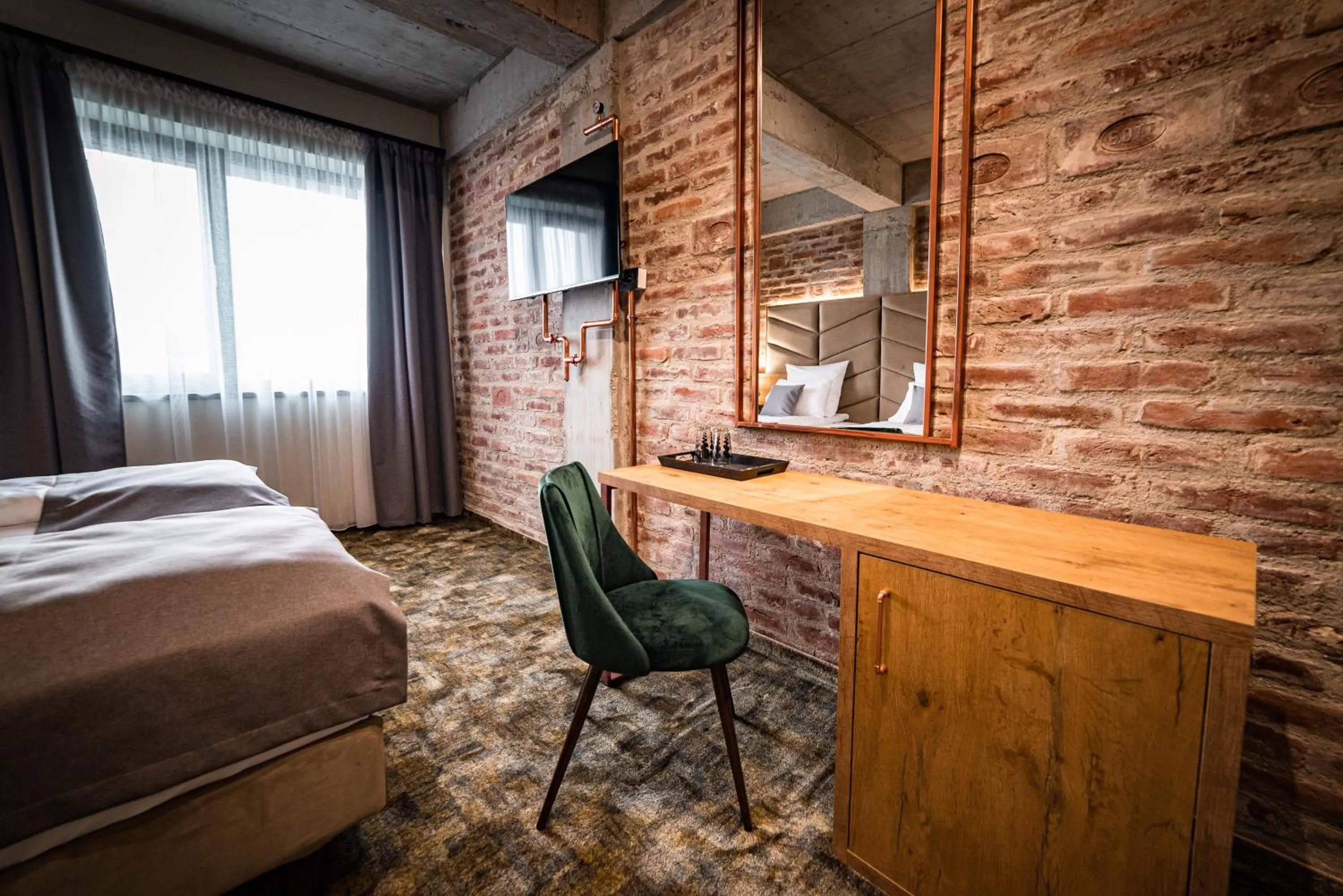 Bed in Mustang Boutique Rooms