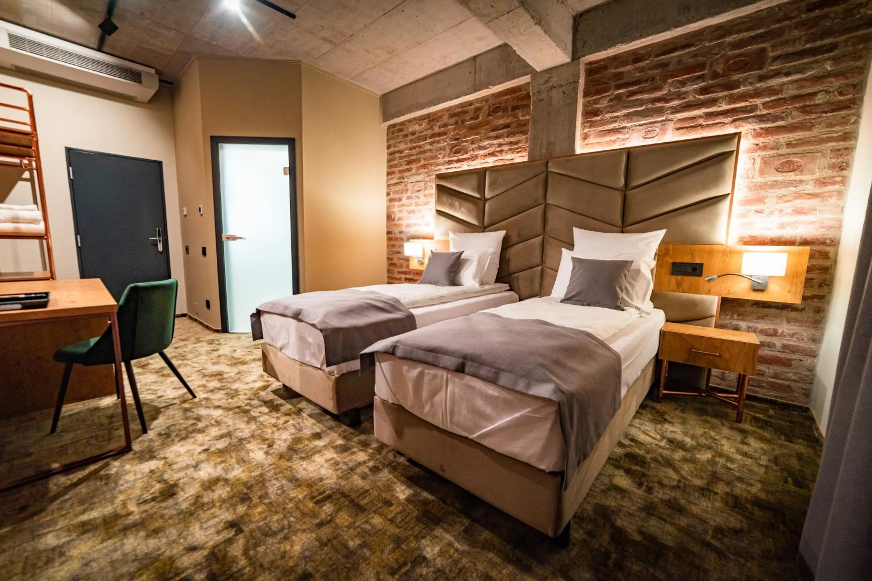 Bed in Mustang Boutique Rooms