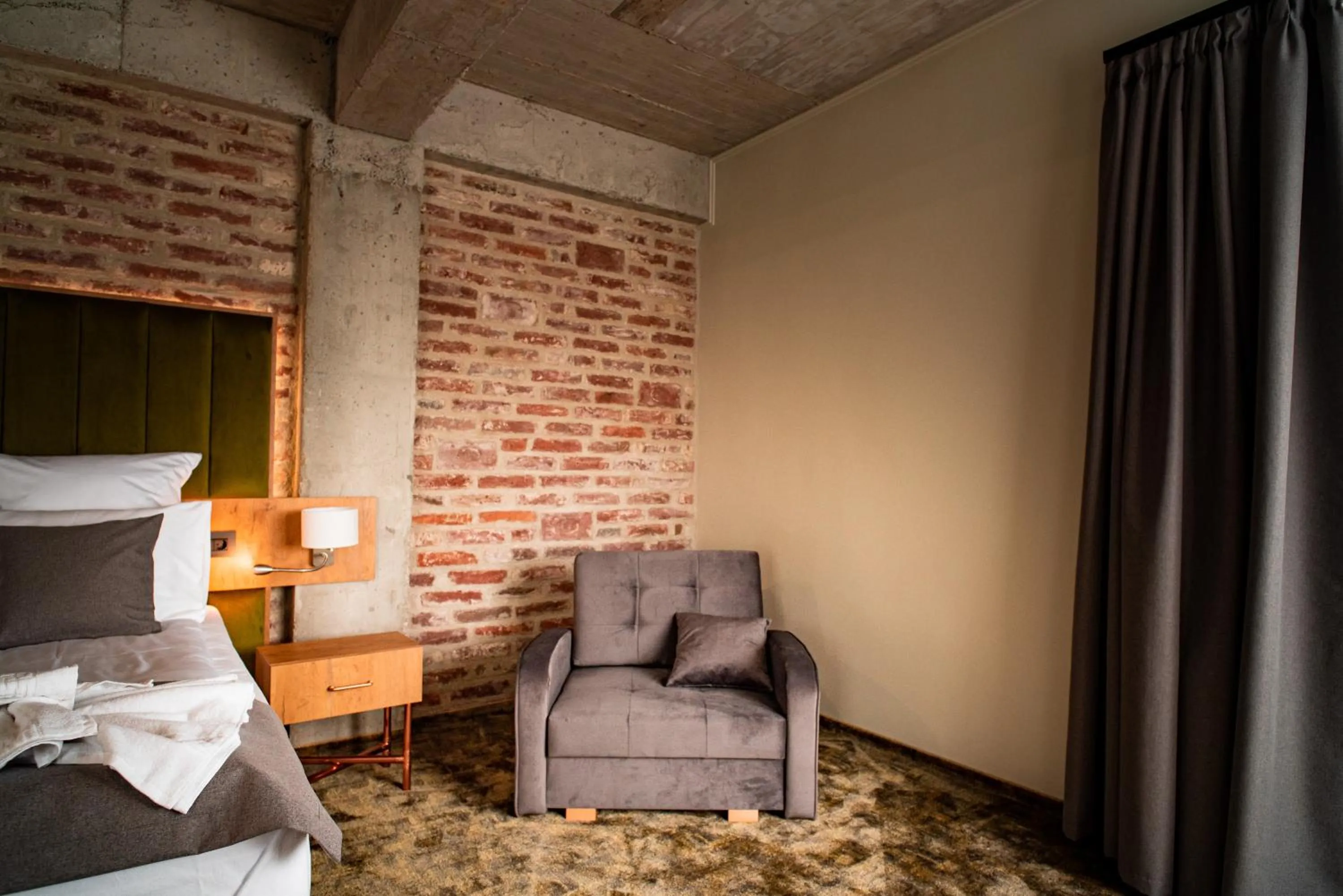 Bed in Mustang Boutique Rooms