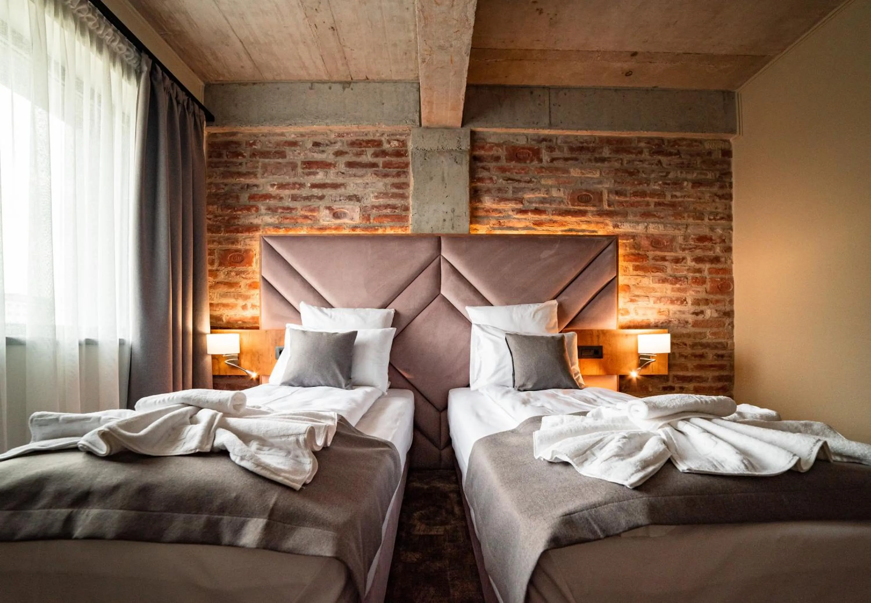 Bed in Mustang Boutique Rooms