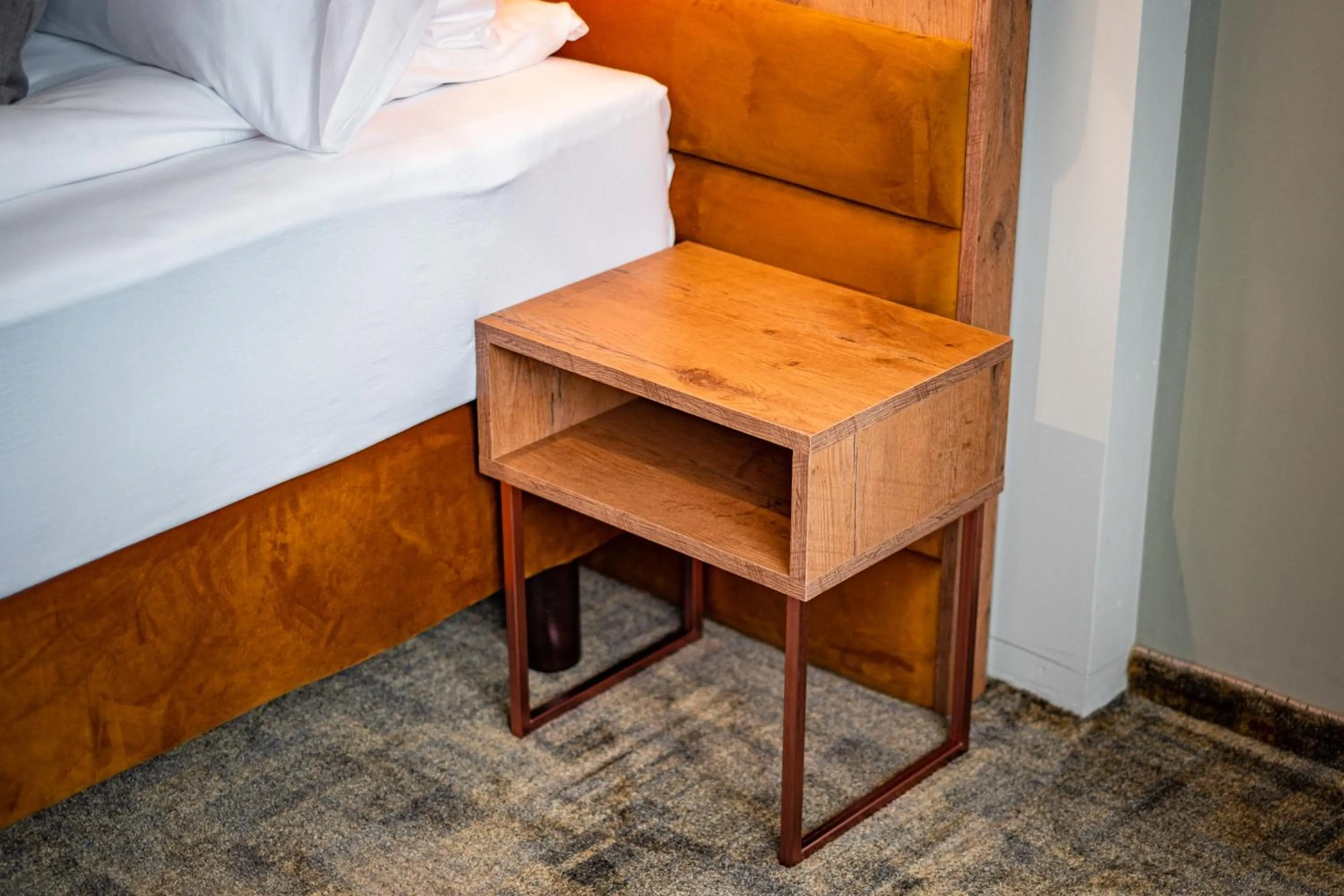 Bed in Mustang Boutique Rooms