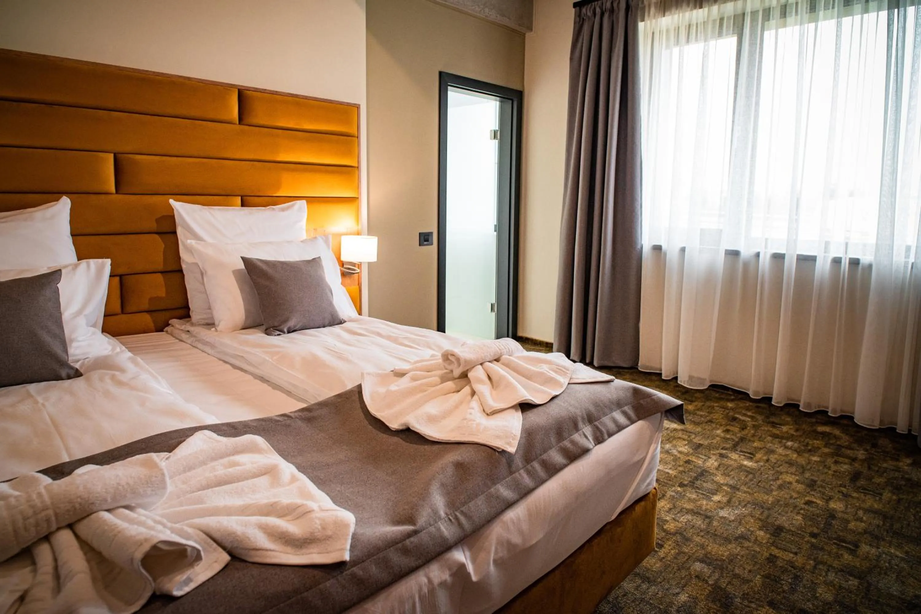 Bed in Mustang Boutique Rooms