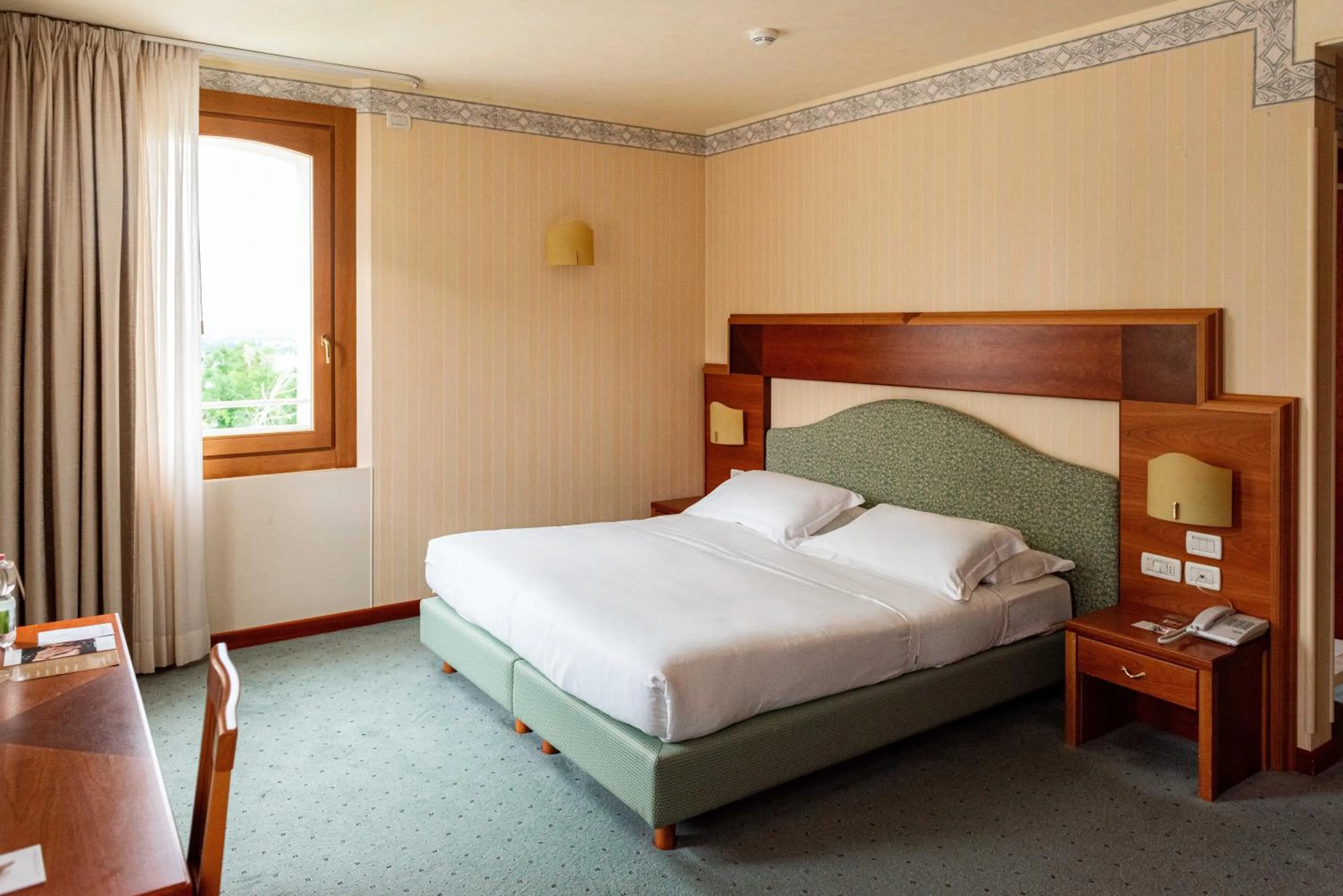 Bed in Phi Hotel Astoria