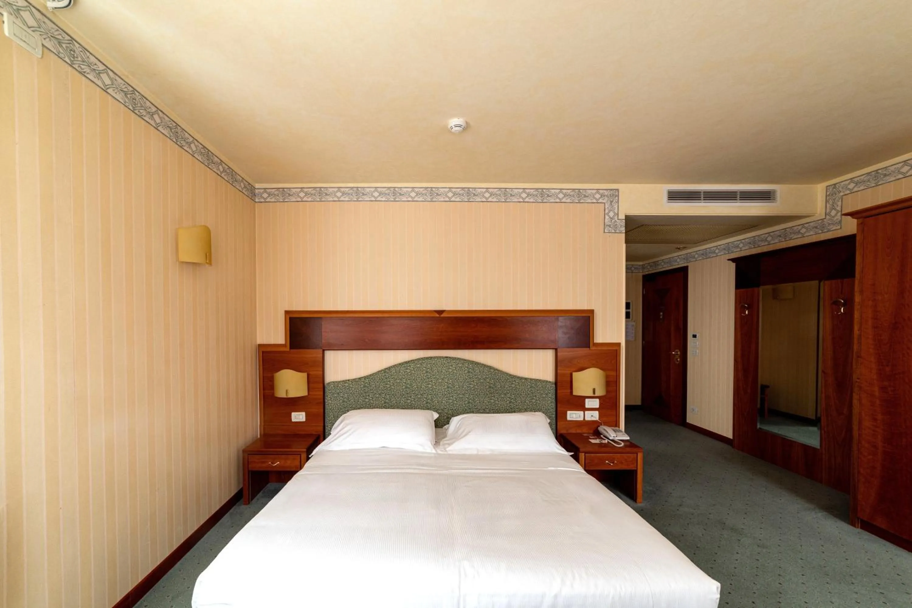 Bed in Phi Hotel Astoria