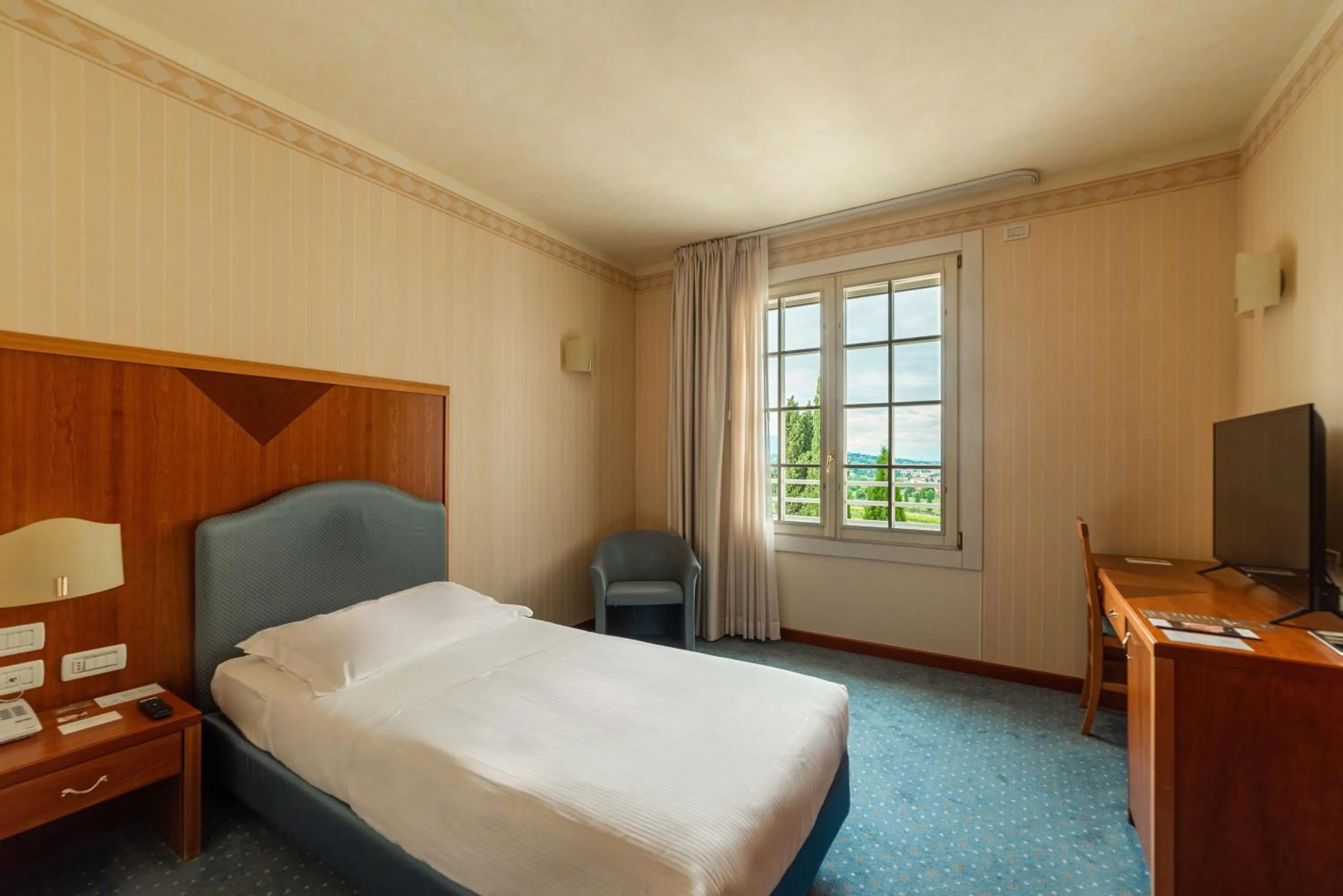 Bed in Phi Hotel Astoria