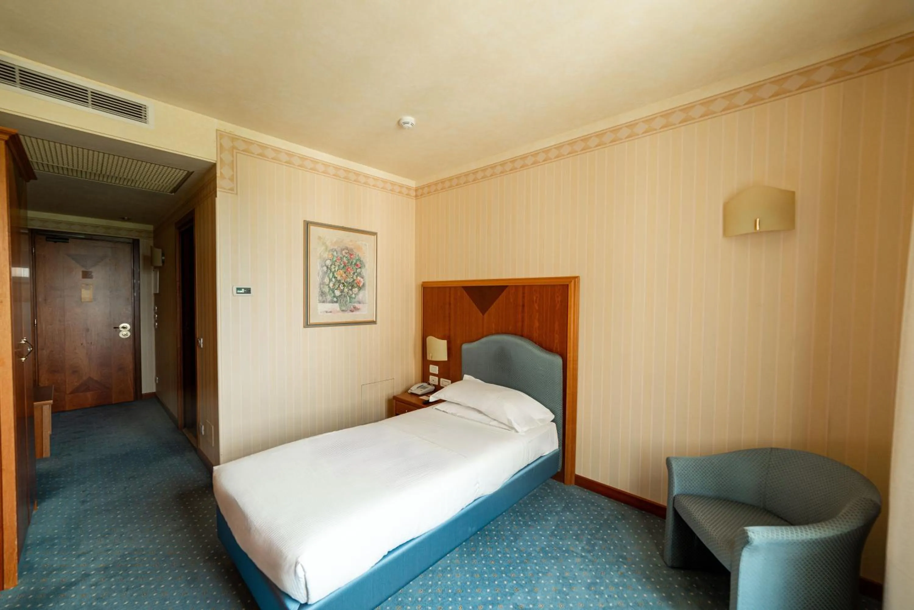 Bed in Phi Hotel Astoria