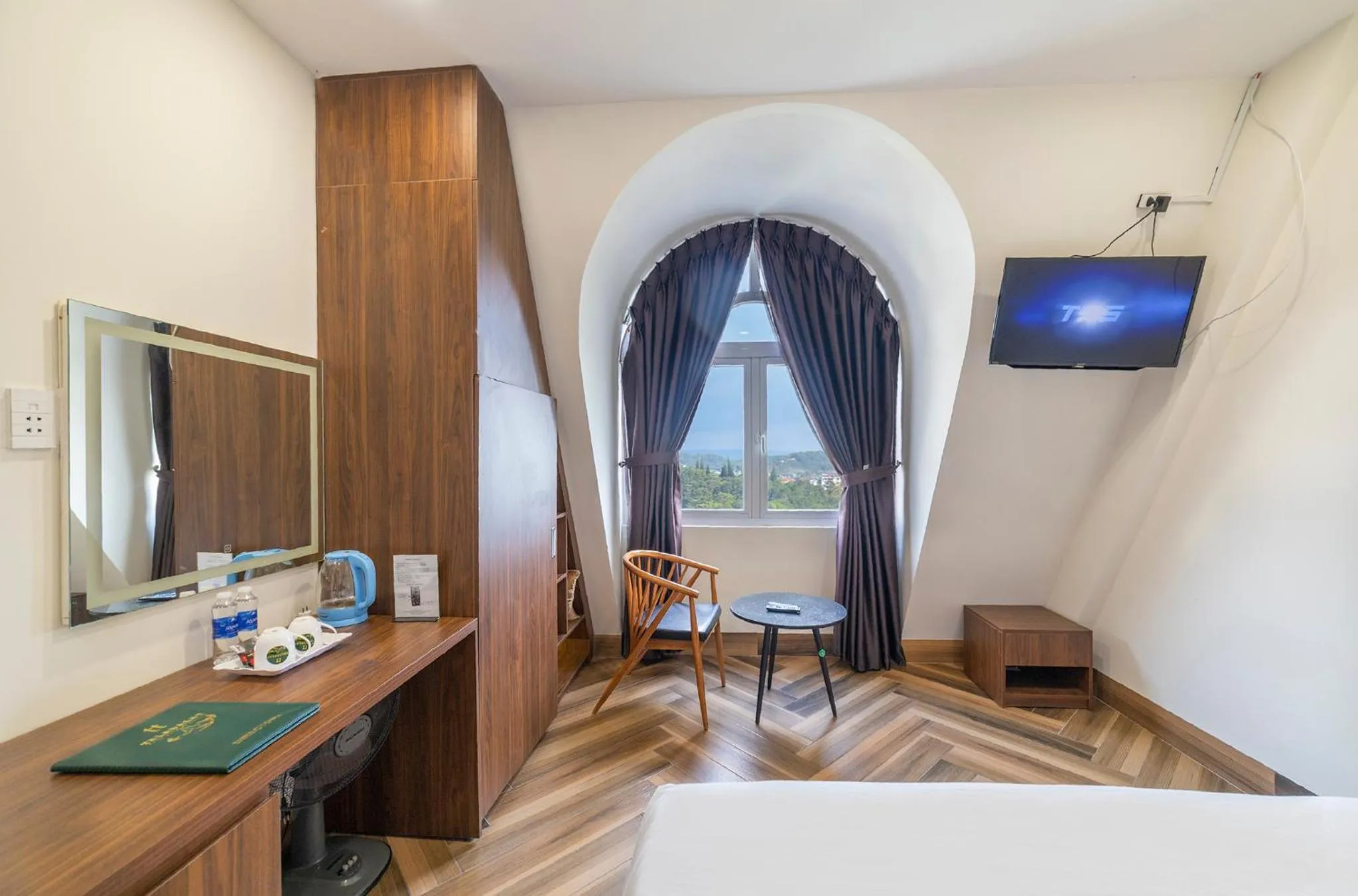 Seating area, Bed in TALA Dalat Hotel