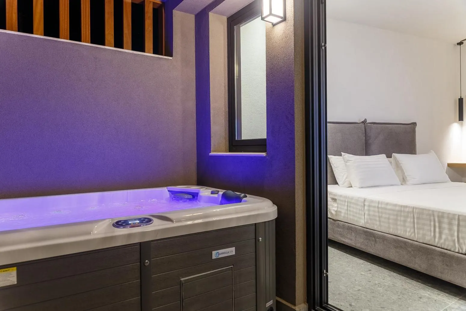 Hot Tub, Bed in Utopia Luxury Suites