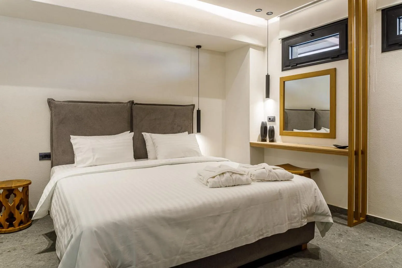 Bed in Utopia Luxury Suites