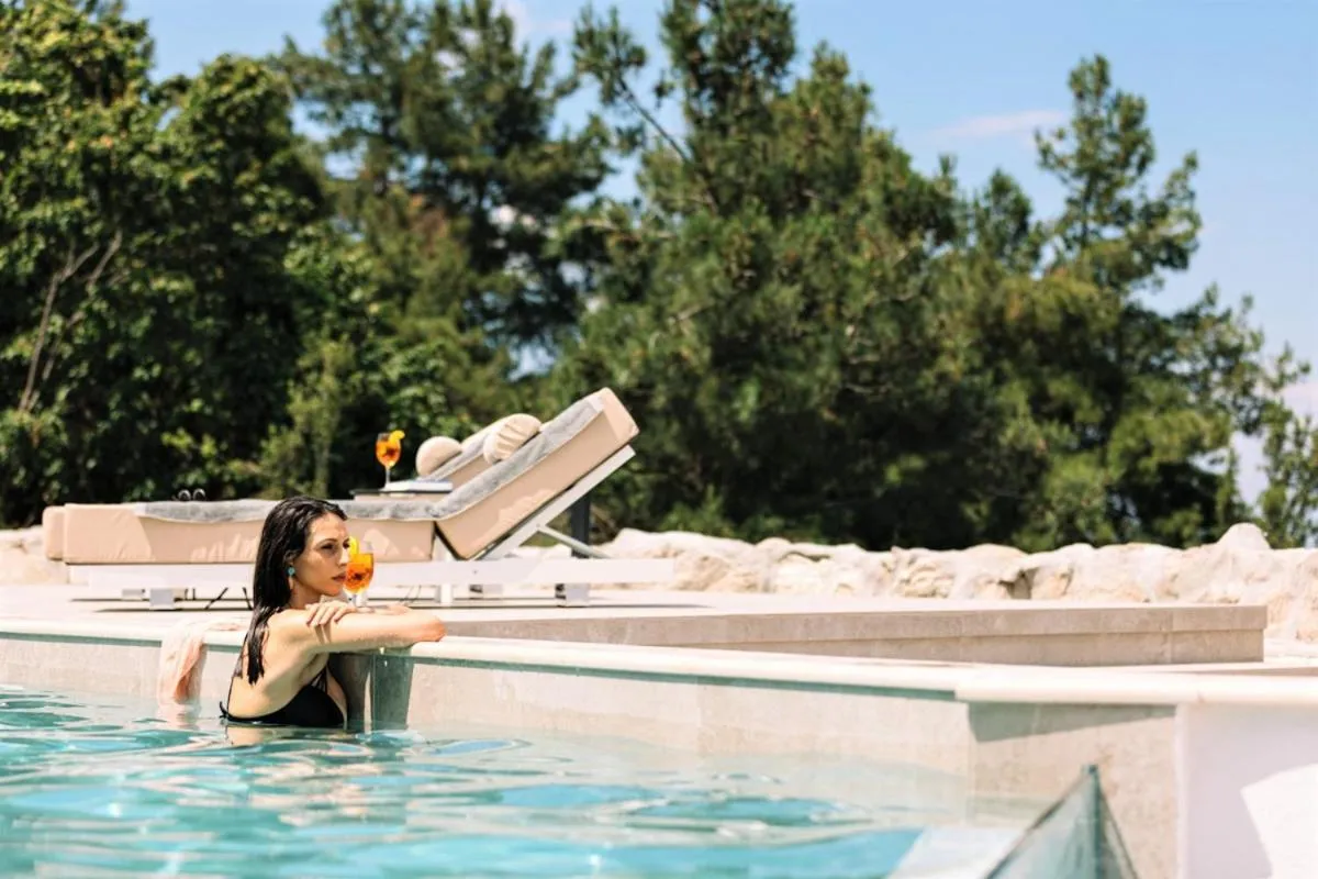 Pool view in Akrotiri Olympus Luxury Suites - Adults Only