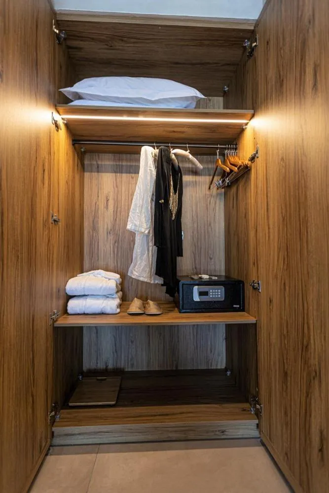 wardrobe in Akrotiri Olympus Luxury Suites - Adults Only