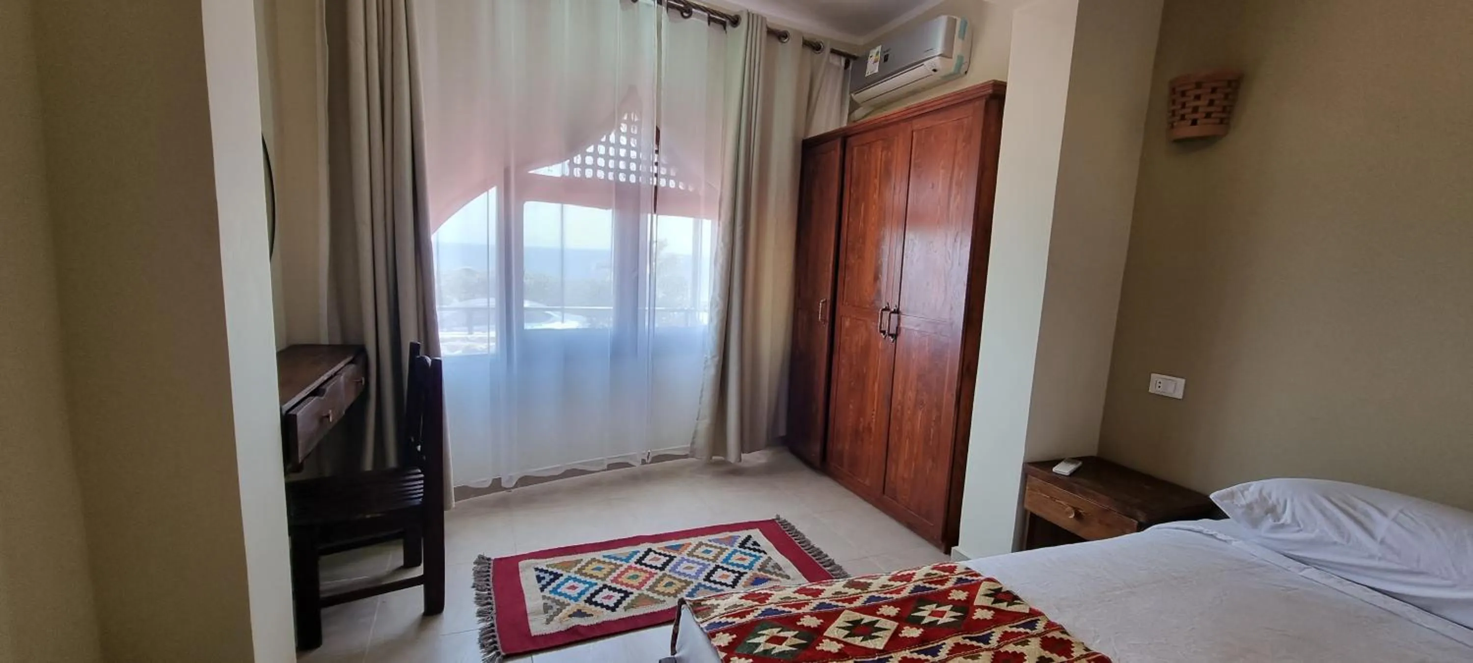 Photo of the whole room, Bed in The Bedouin Moon