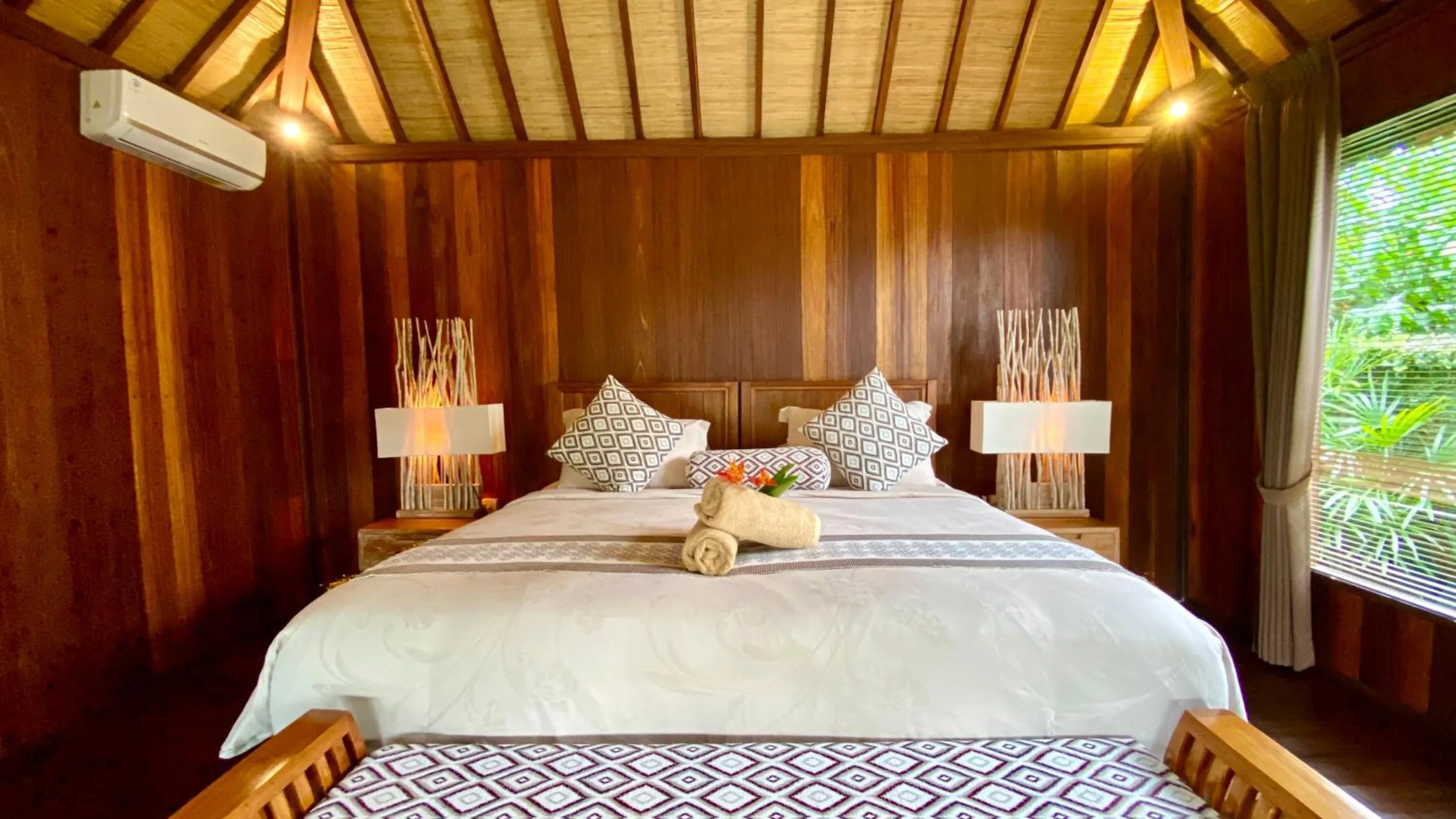 Bed in NILUH Private Villas Ubud