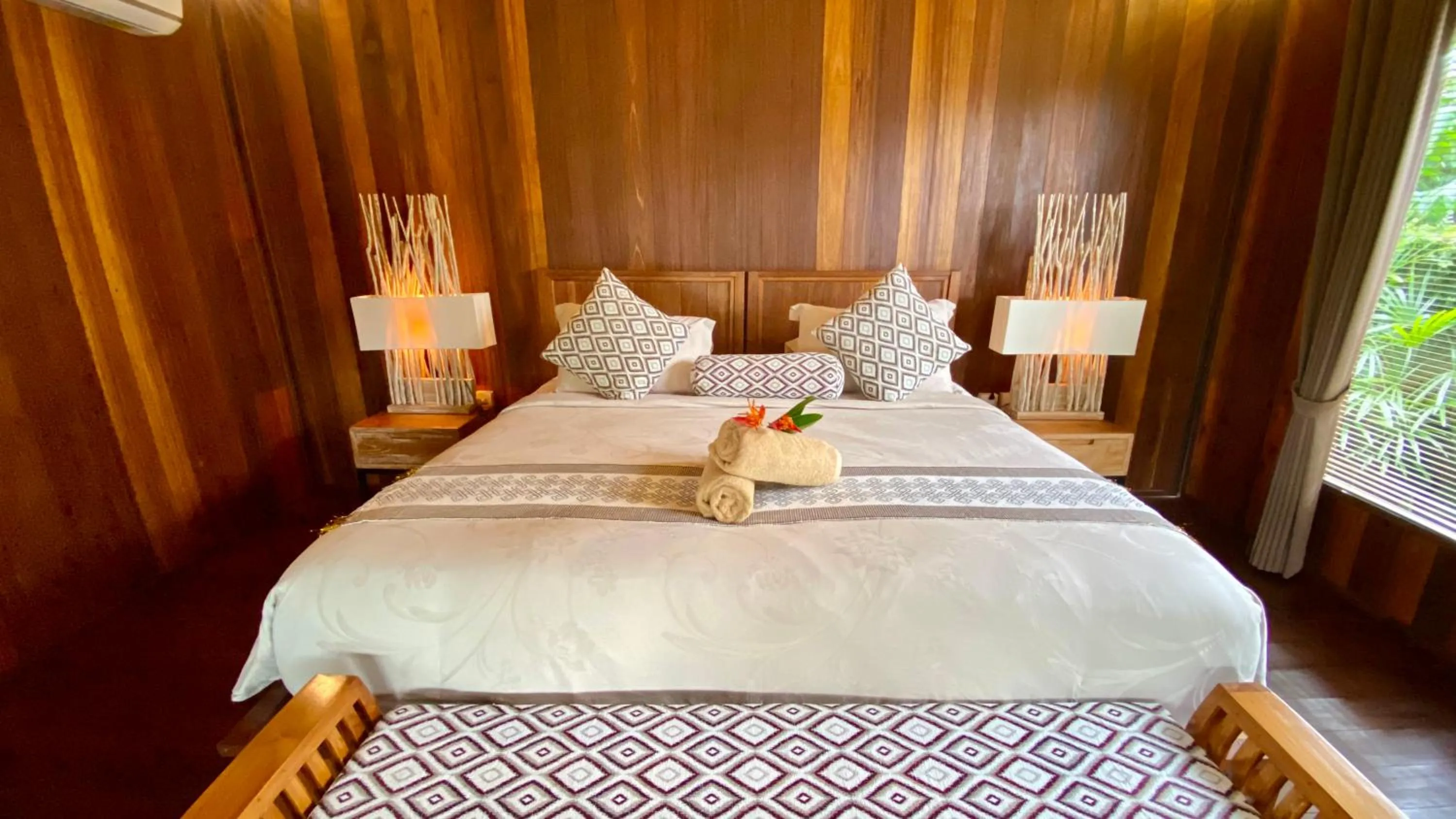 Bed in NILUH Private Villas Ubud