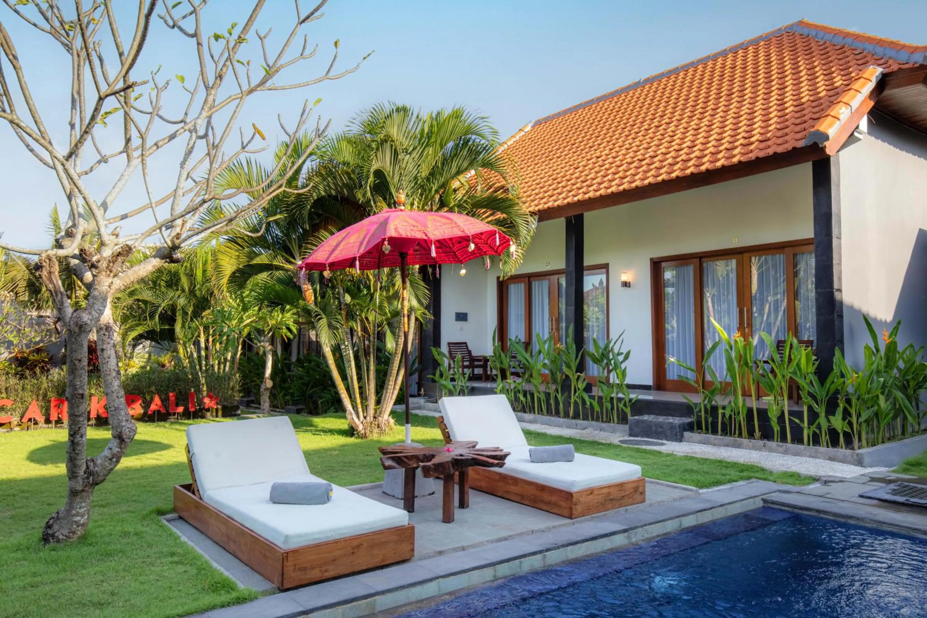 Swimming pool in Carik Bali Guest House Canggu