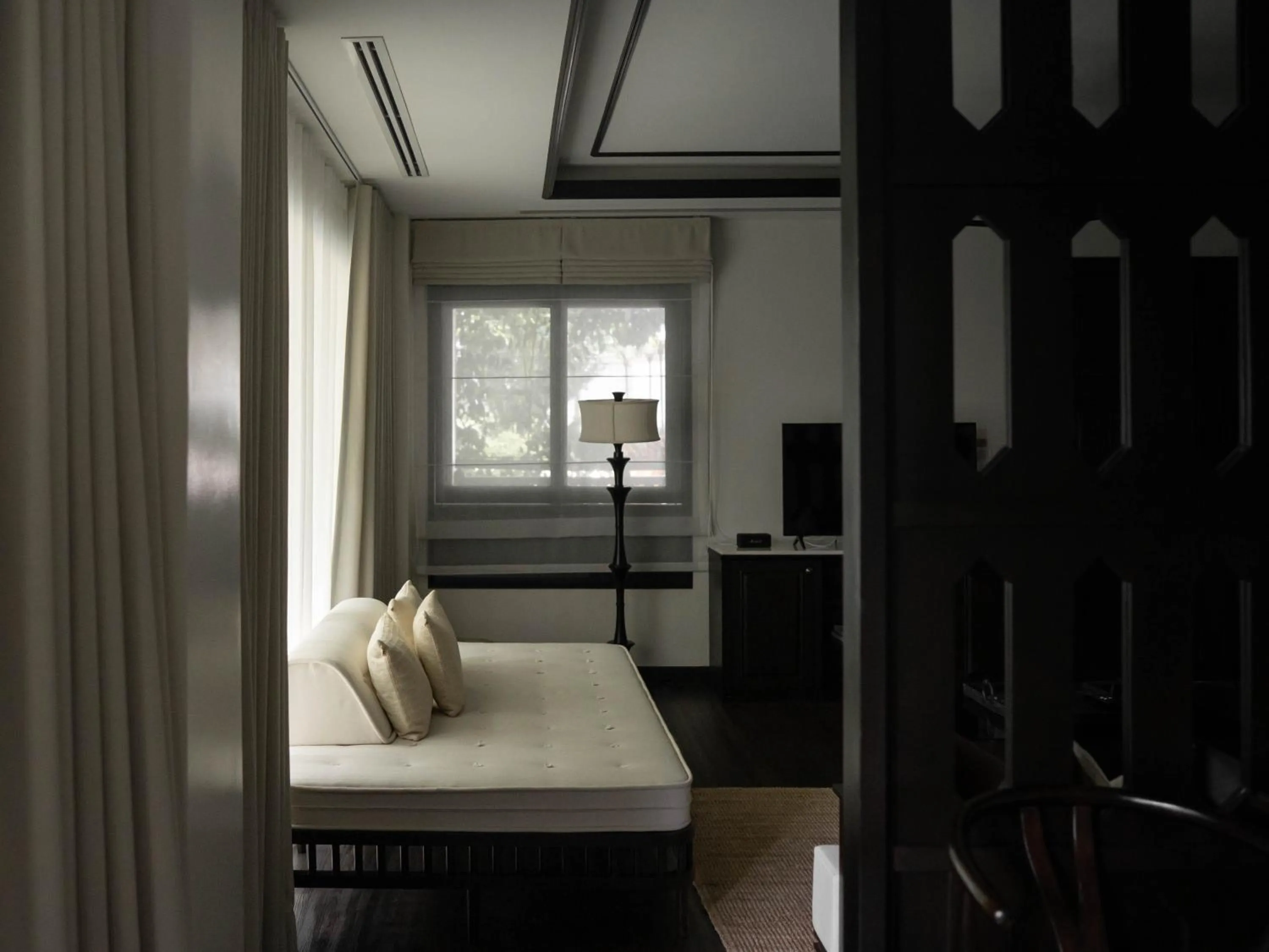 Seating area, Bed in Burirattana Hotel-An Adults Only Hotel