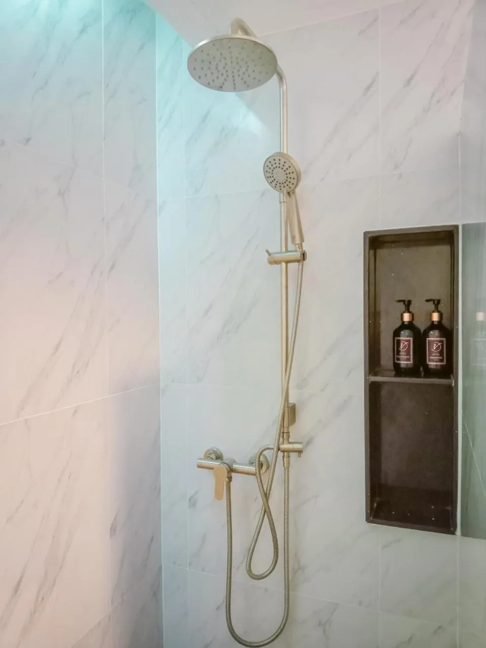 Shower in HATCHAO HERITAGE BEACH FRONT RESORT