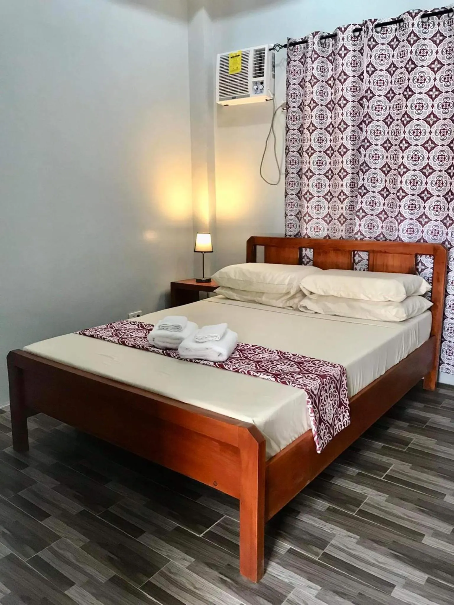 Bed in RedDoorz at Gracia's Calzada Inn Camiguin