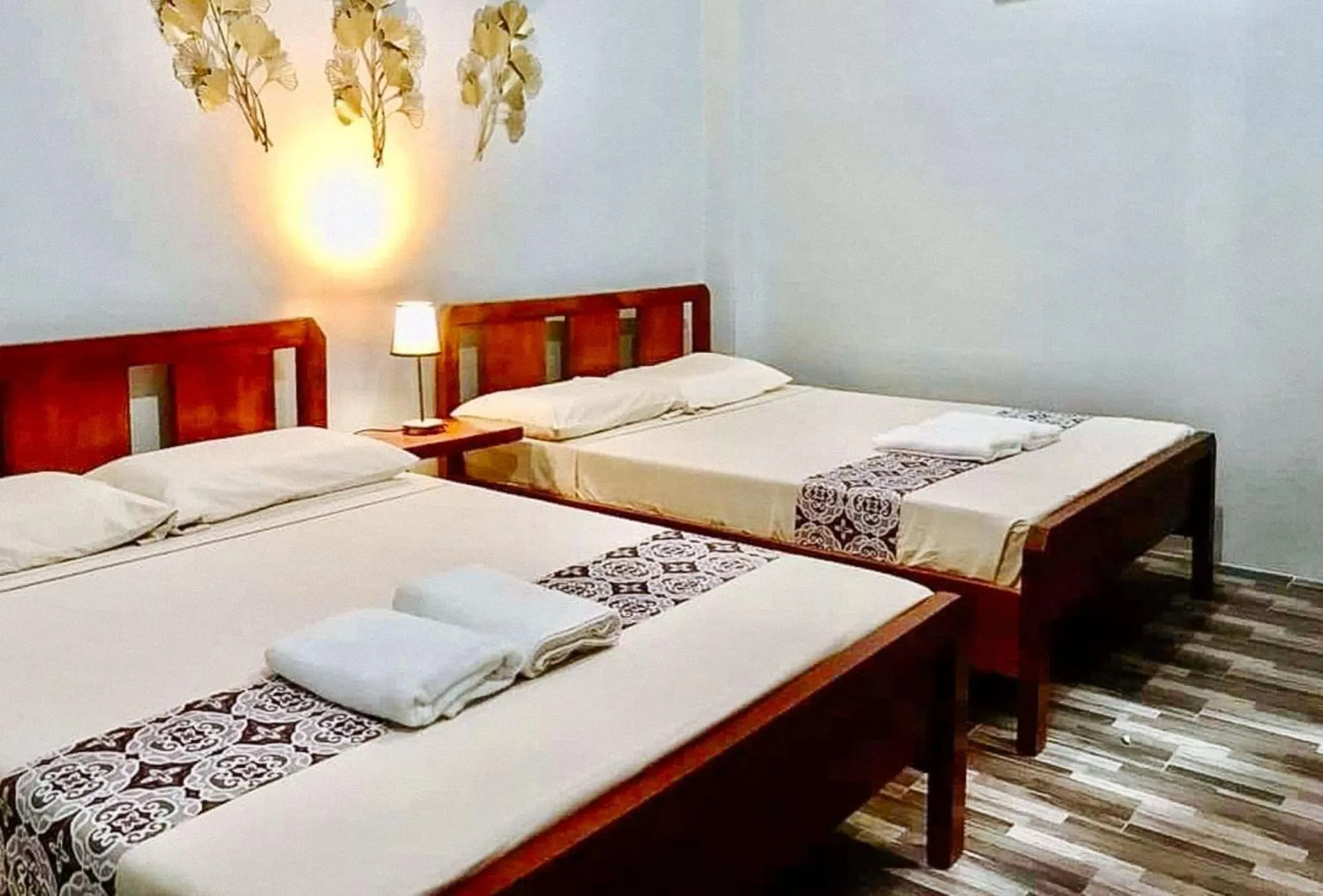 Bed in RedDoorz at Gracia's Calzada Inn Camiguin