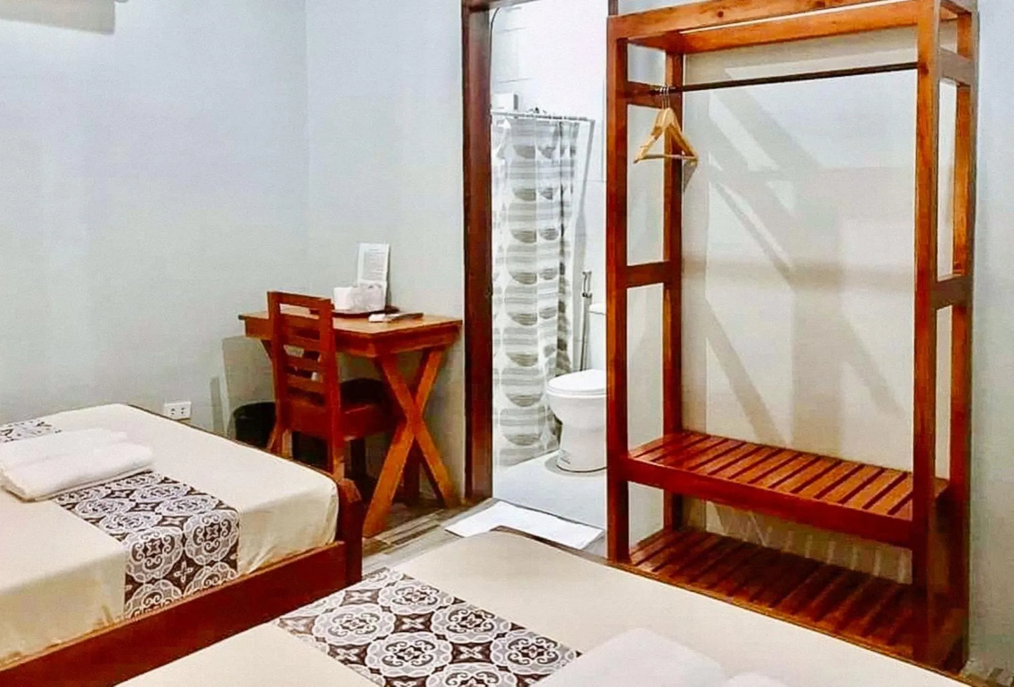 Bed in RedDoorz at Gracia's Calzada Inn Camiguin