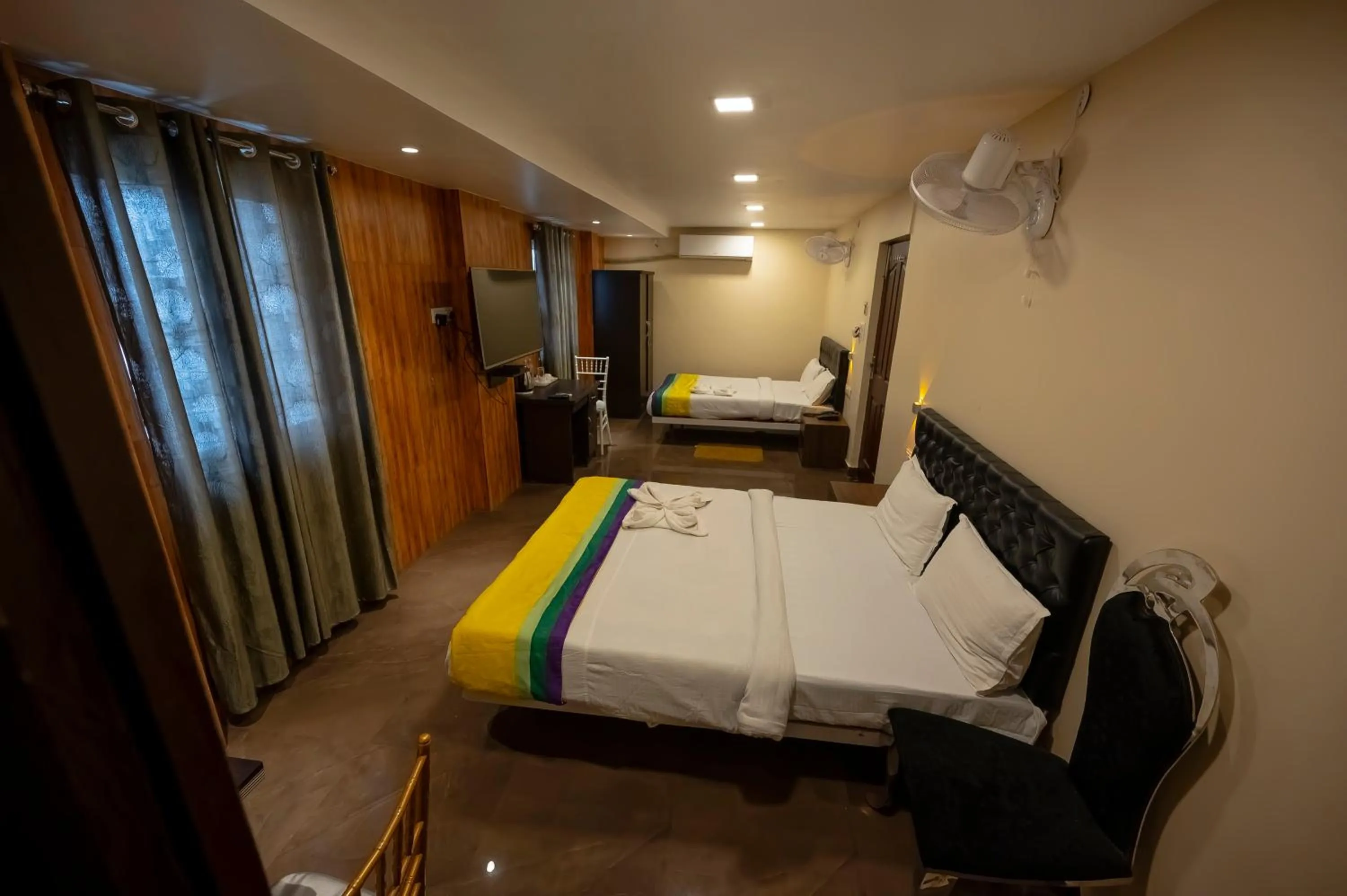 Bed in HOTEL MITTAL GARDEN