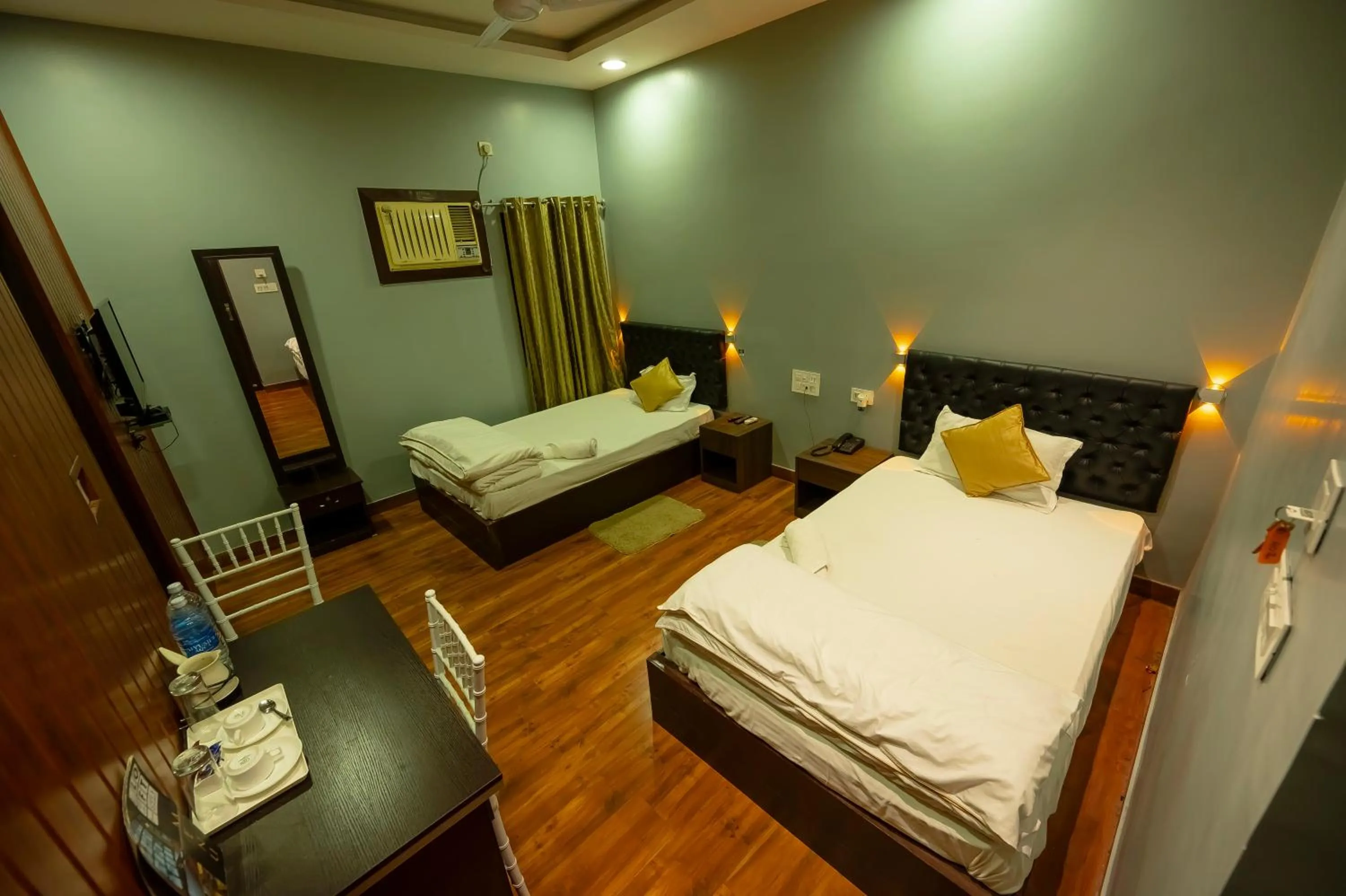 Bed in HOTEL MITTAL GARDEN