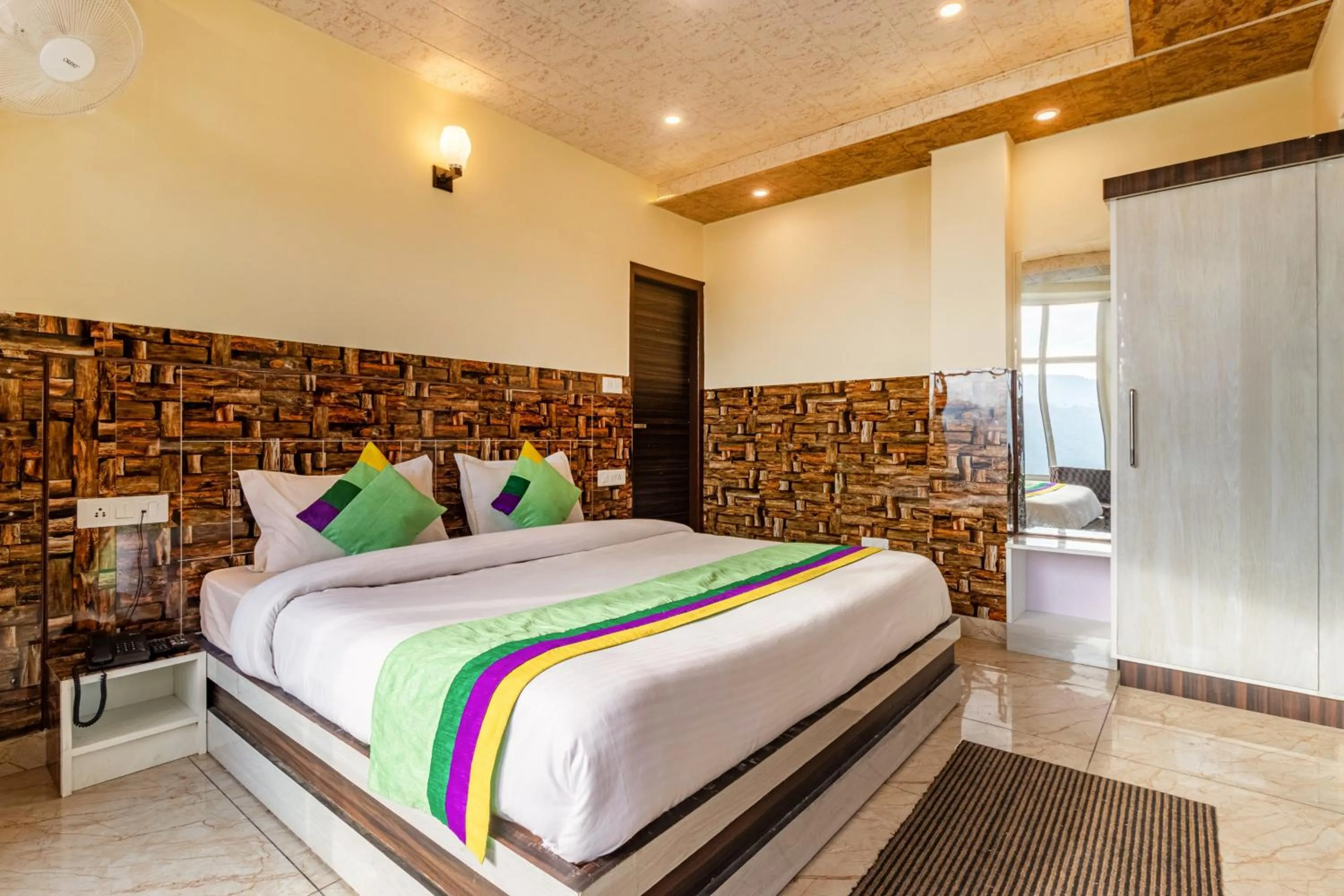 Bedroom in Treebo Srishti Vaikunth With Mountain View