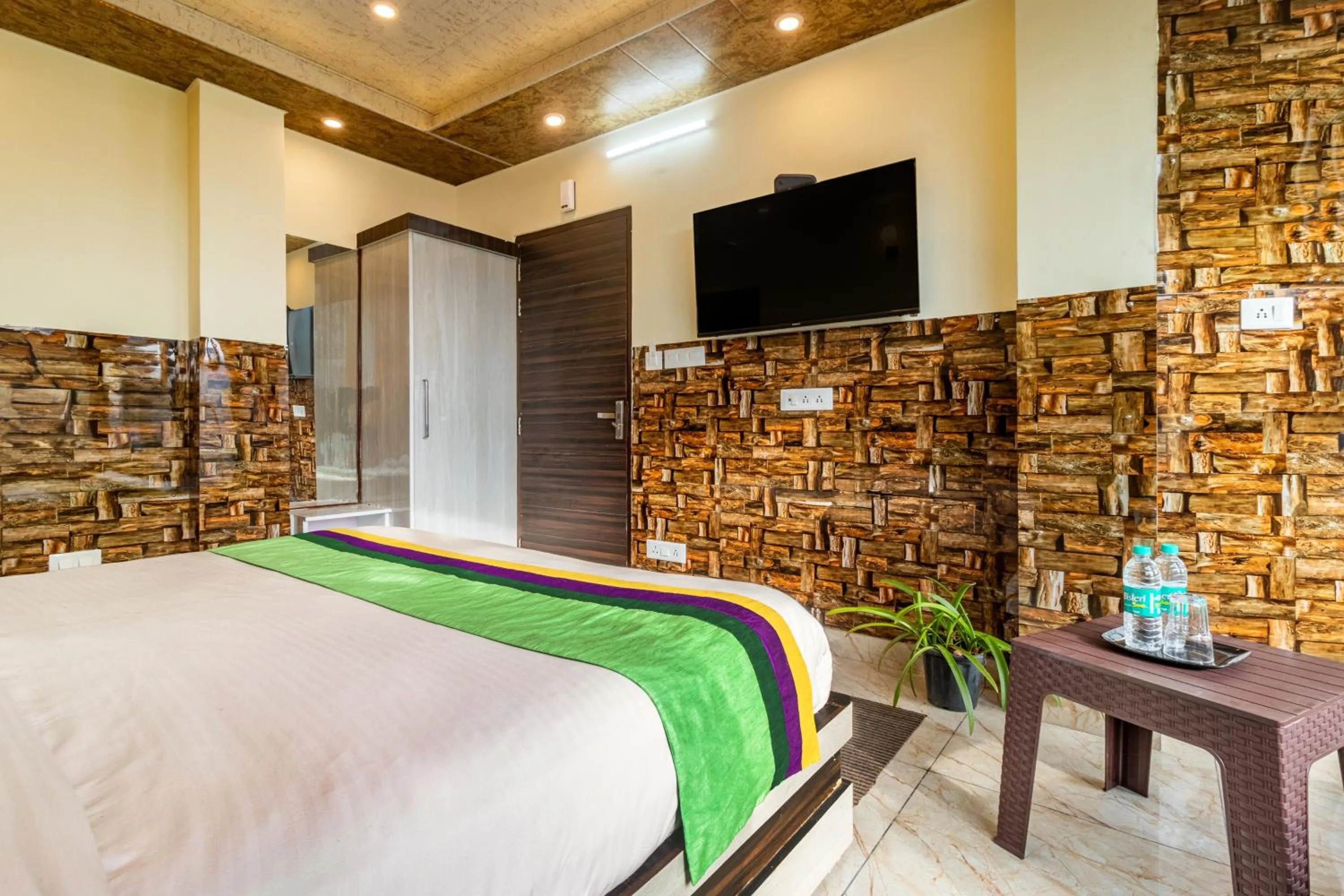 Bedroom in Treebo Srishti Vaikunth With Mountain View