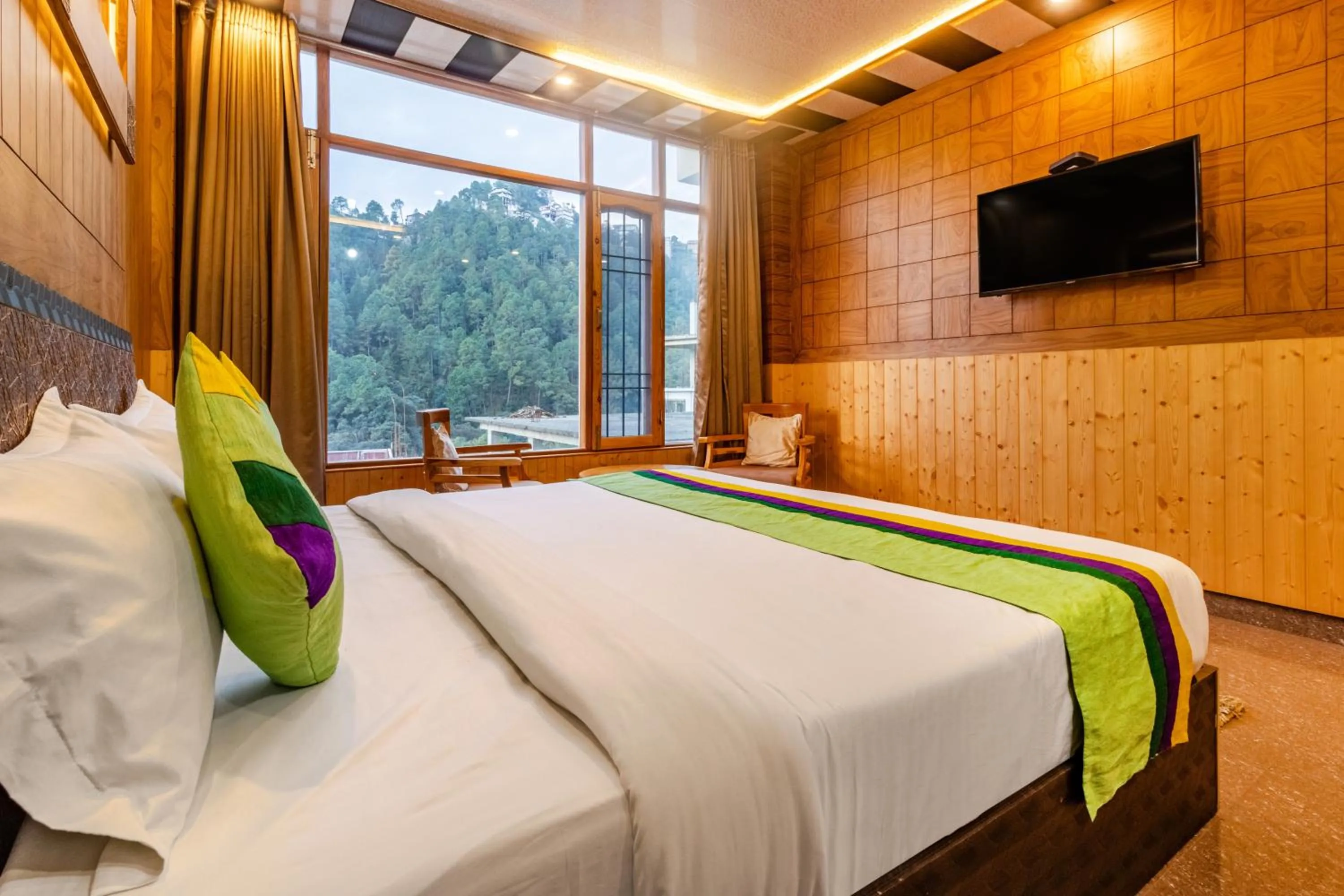 Bedroom in Treebo Srishti Vaikunth With Mountain View