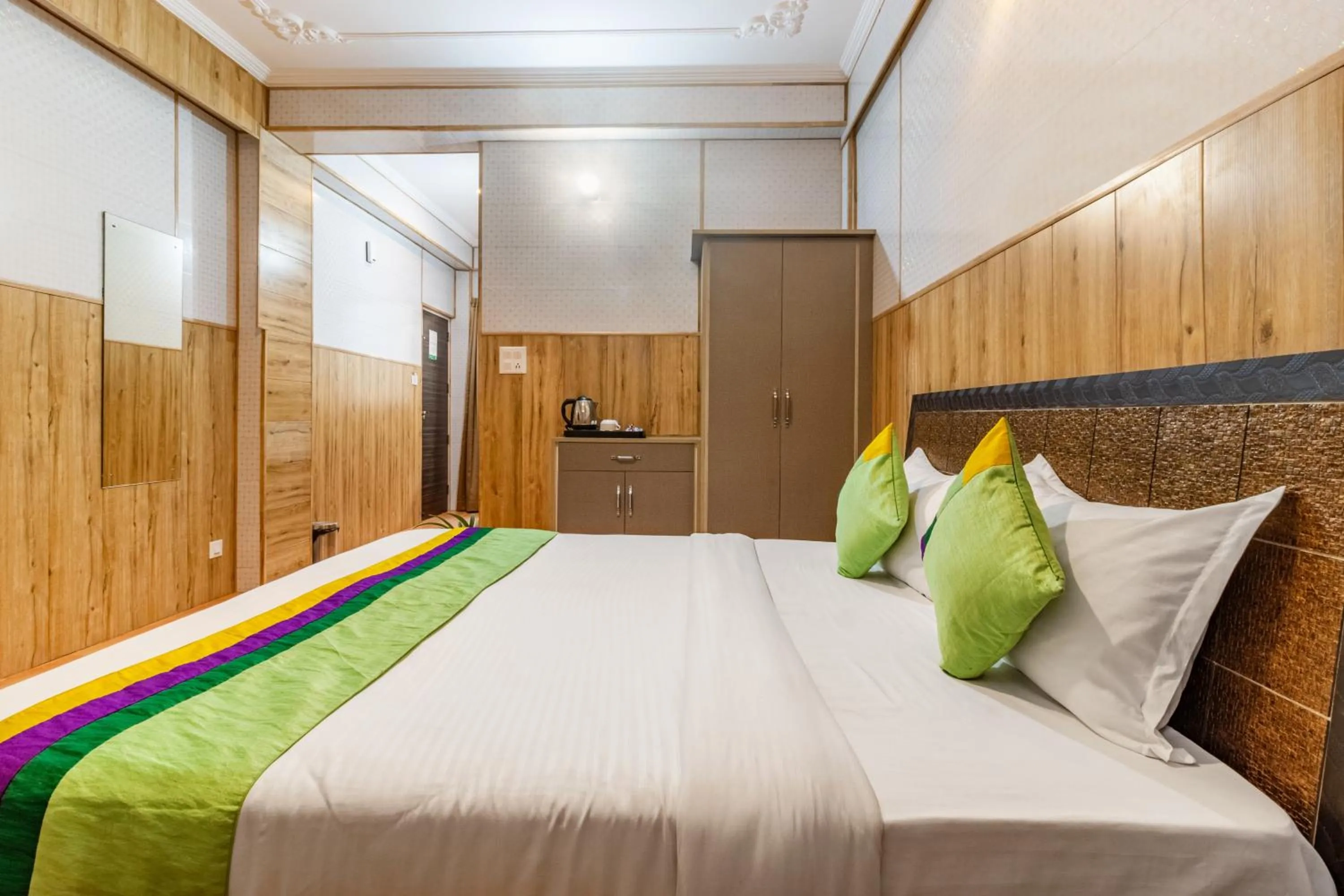 Bedroom in Treebo Srishti Vaikunth With Mountain View