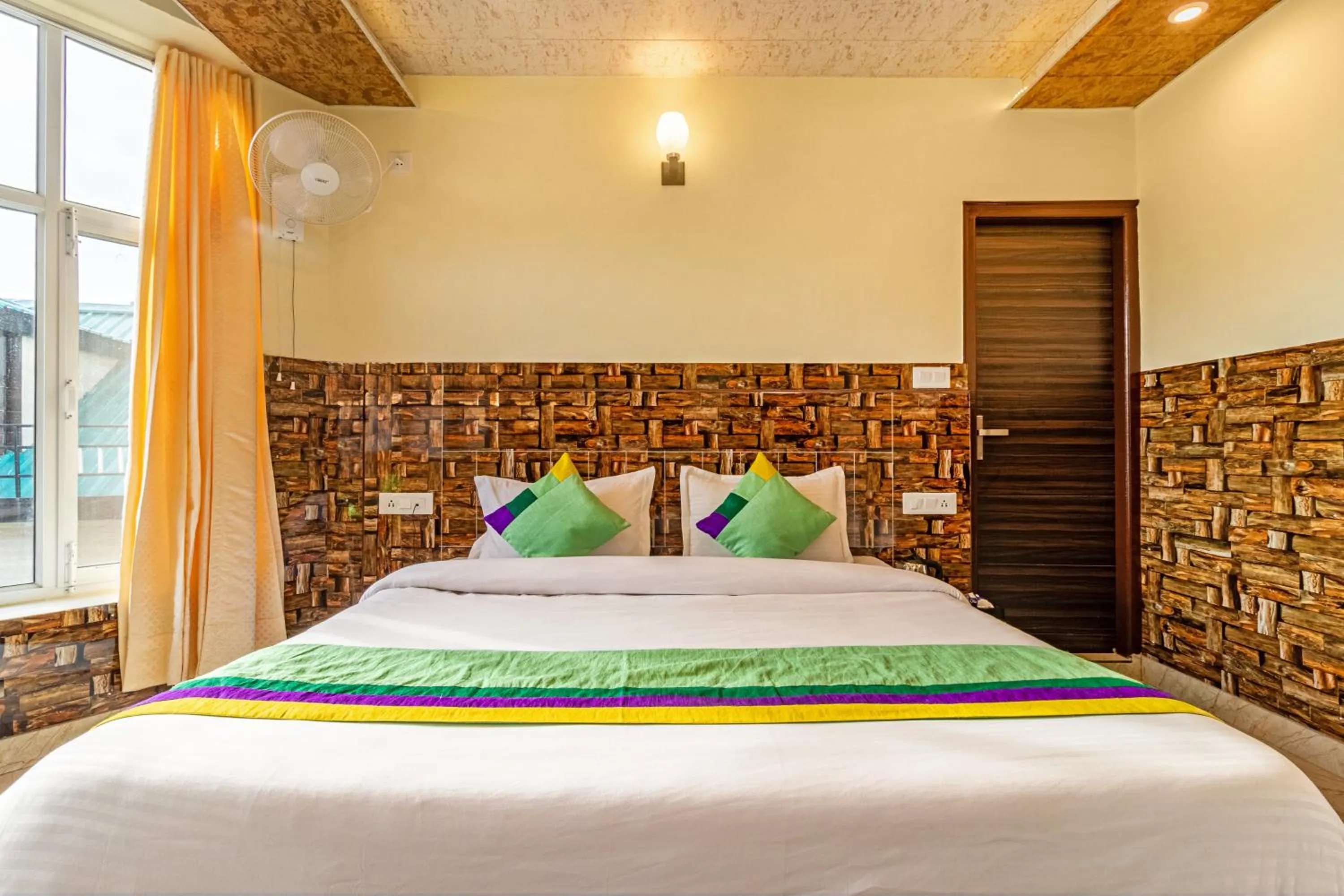 Bedroom in Treebo Srishti Vaikunth With Mountain View