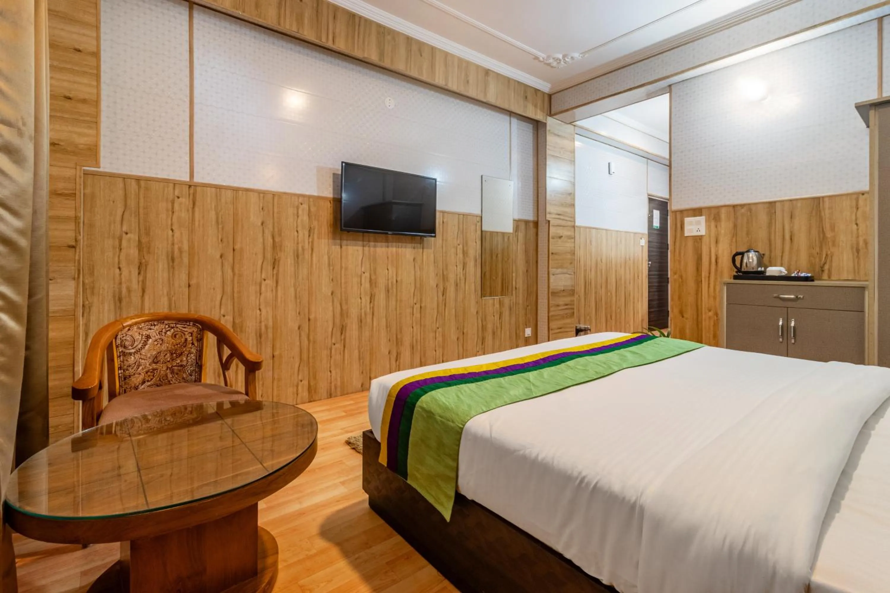 Bedroom in Treebo Srishti Vaikunth With Mountain View