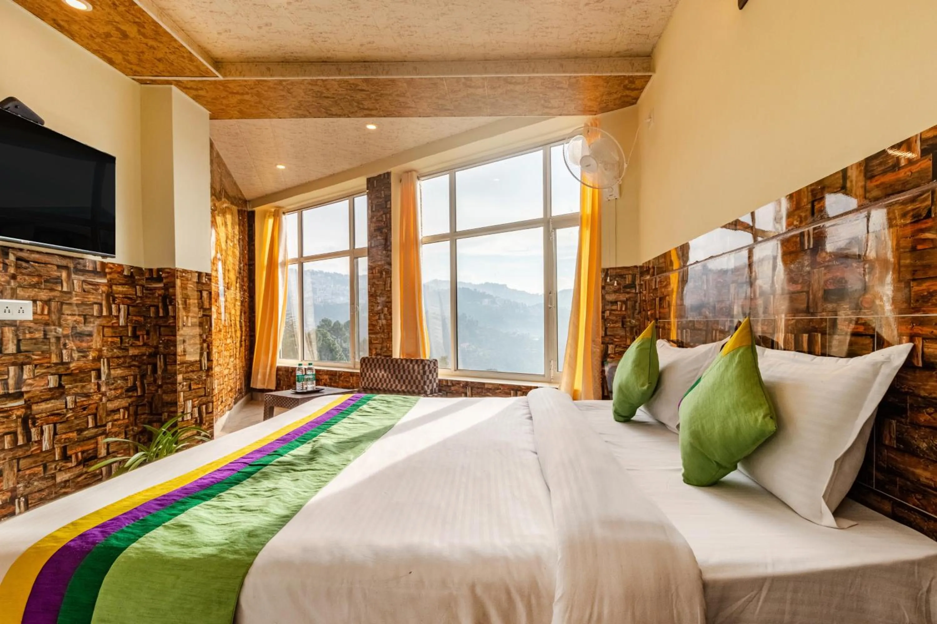 Bedroom in Treebo Srishti Vaikunth With Mountain View