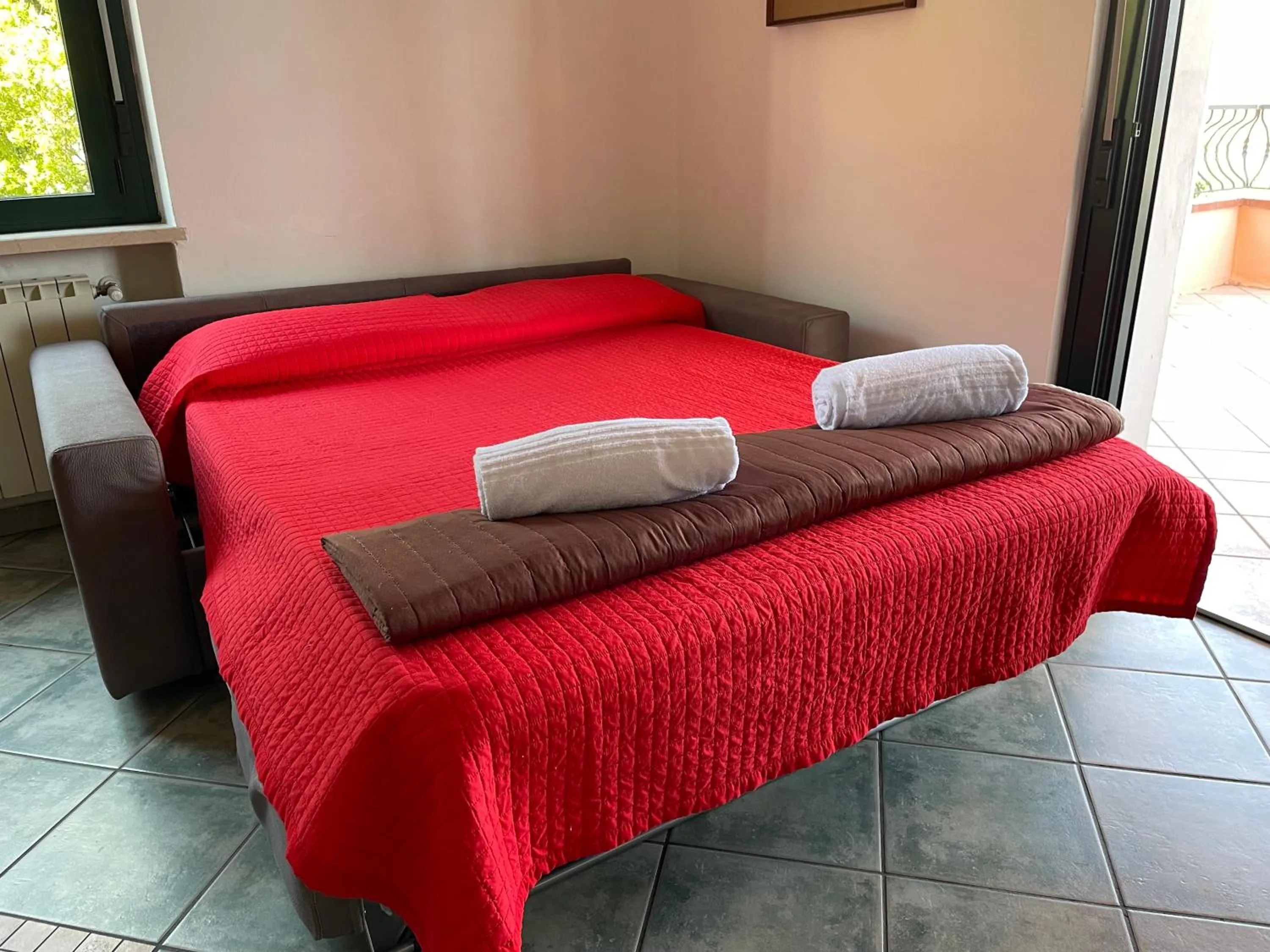 Living room, Bed in Residence Bellavista