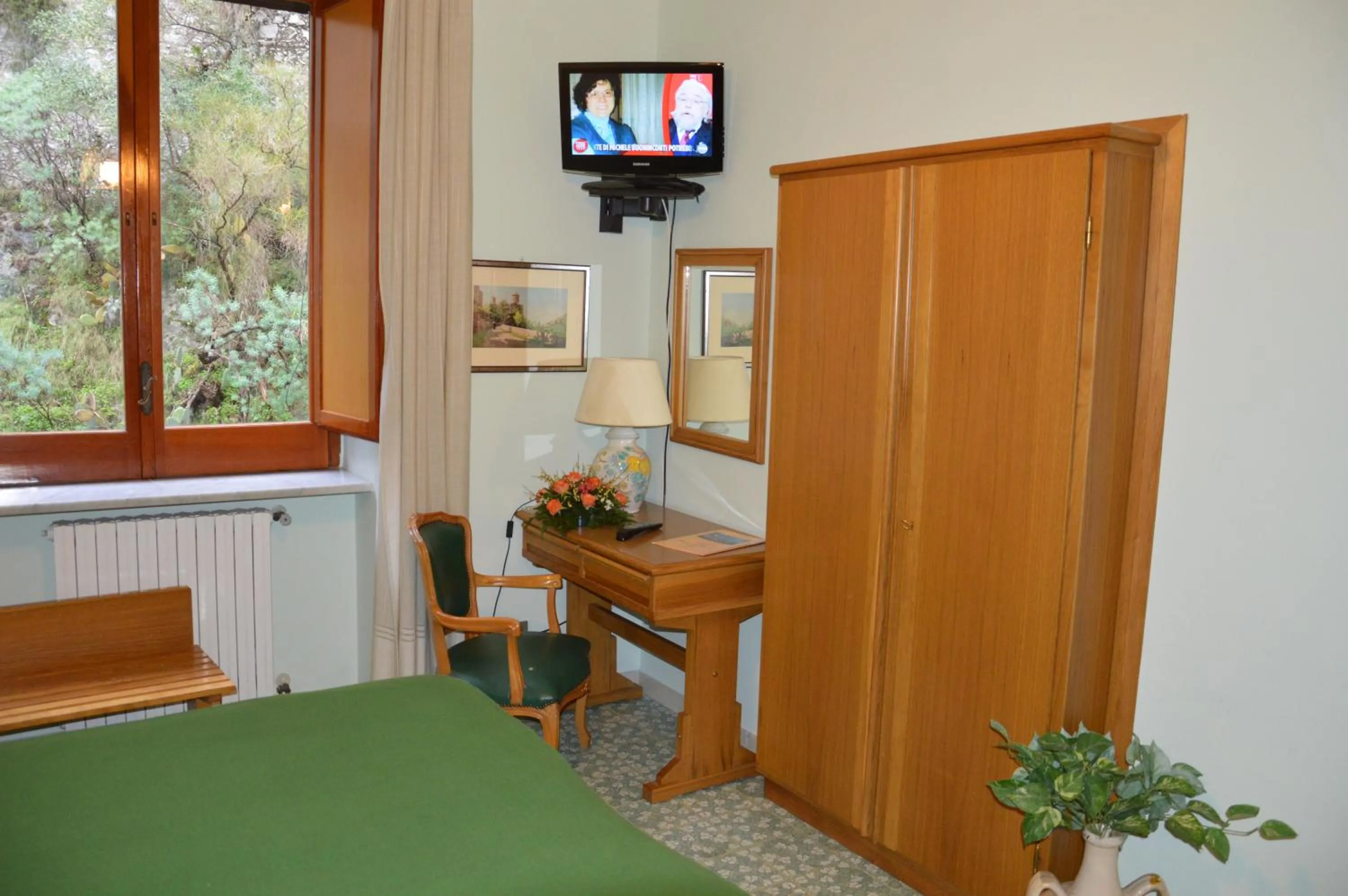 Communal lounge/ TV room in Hotel La Bussola