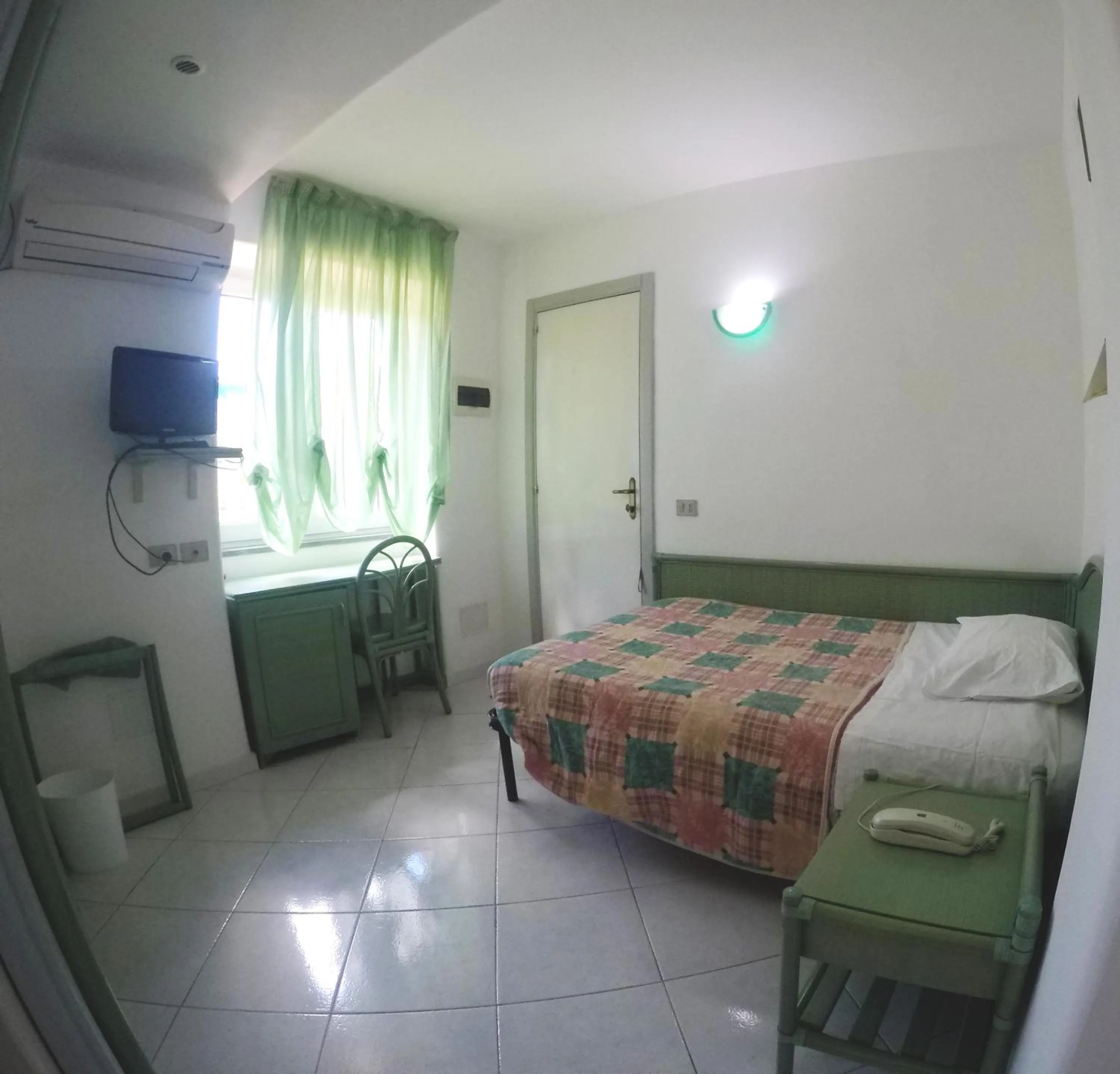 Bed in Hotel Rosetta