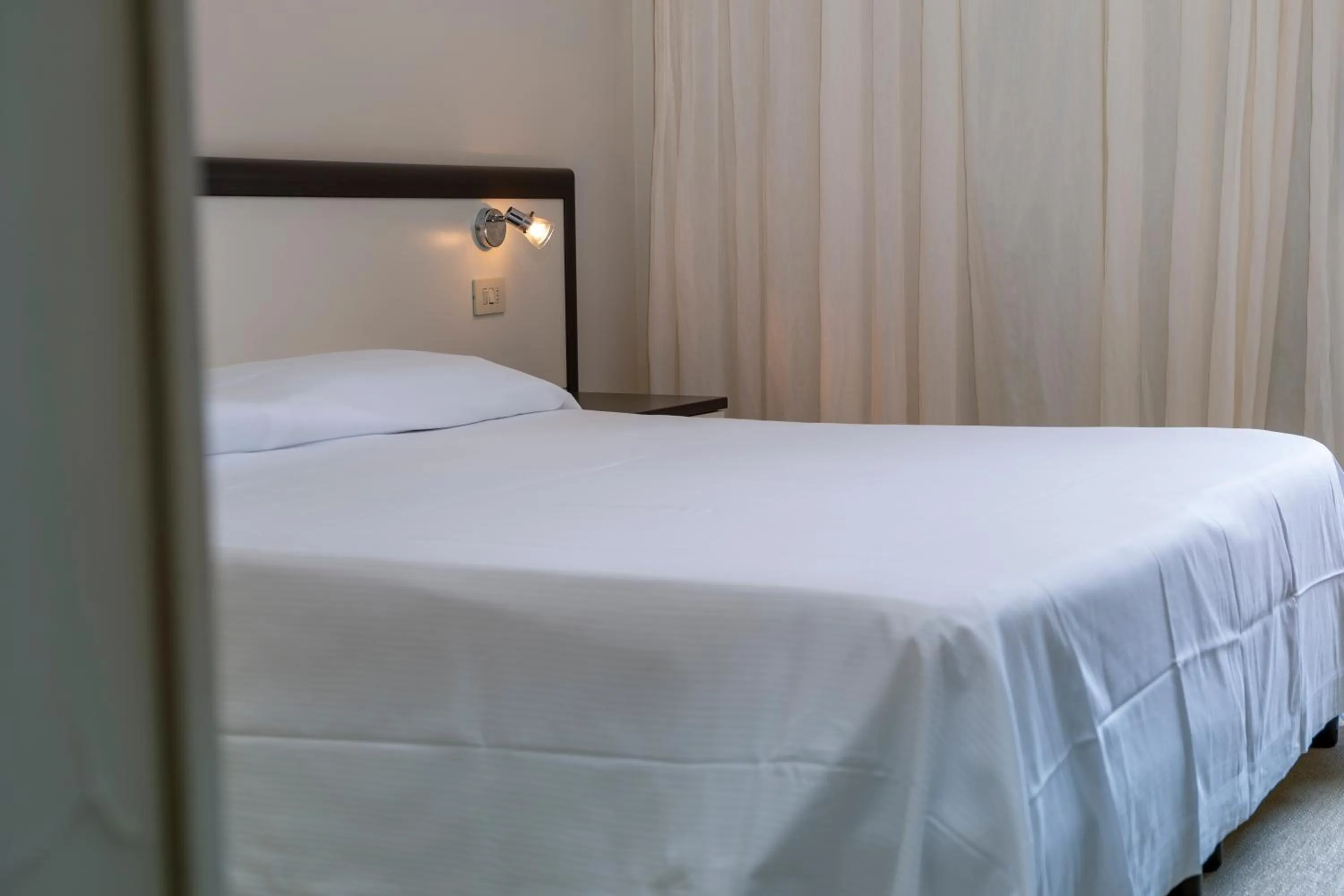 Bed in Hotel Fabricia