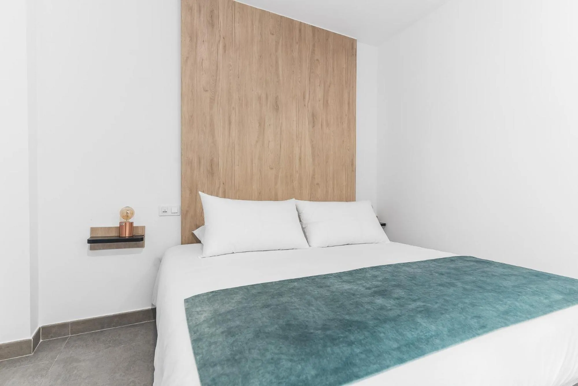 Bed in Open Sea Suites