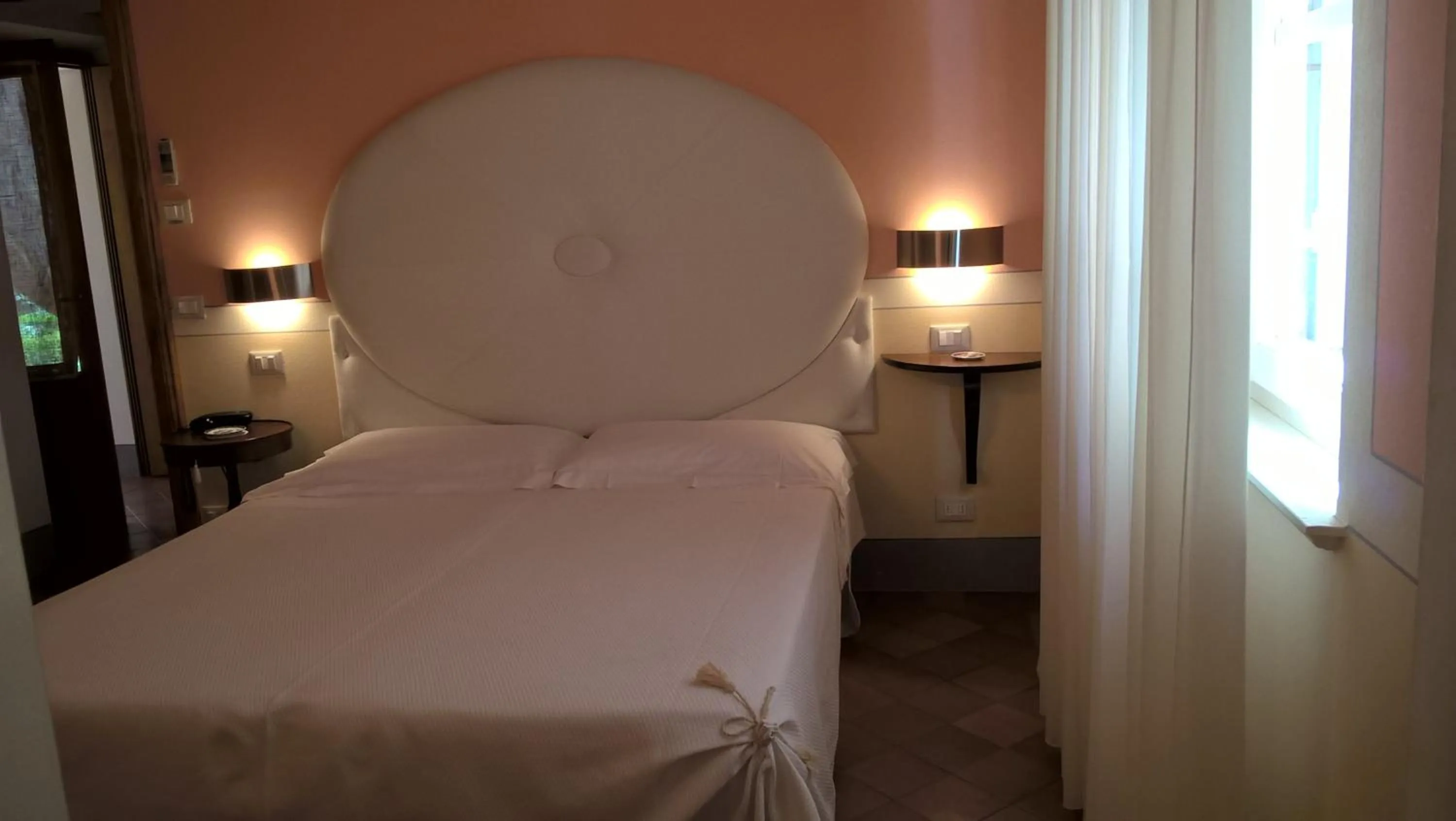 Bed in Il Rondò Boutique Hotel