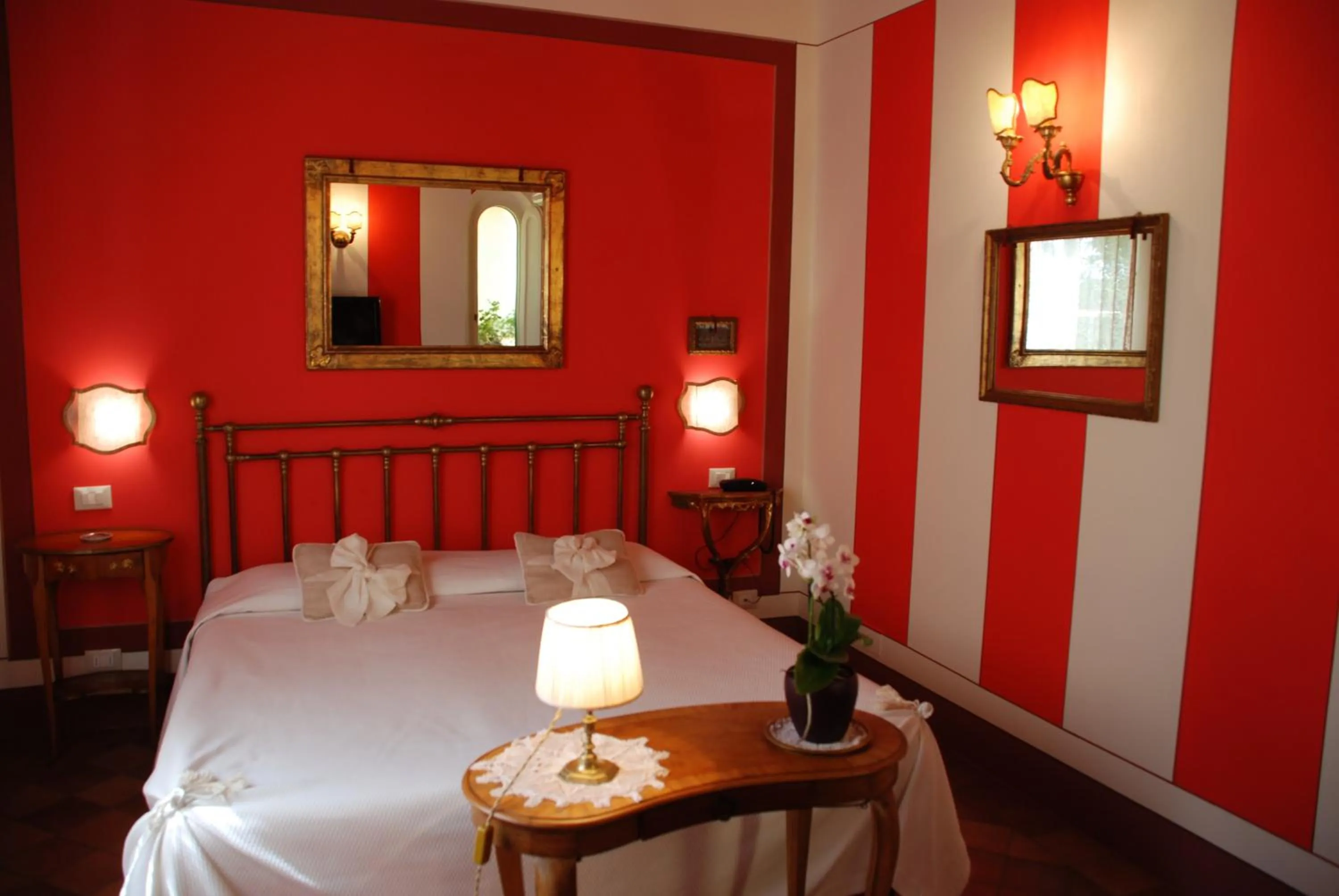 Bedroom in Il Rondò Boutique Hotel