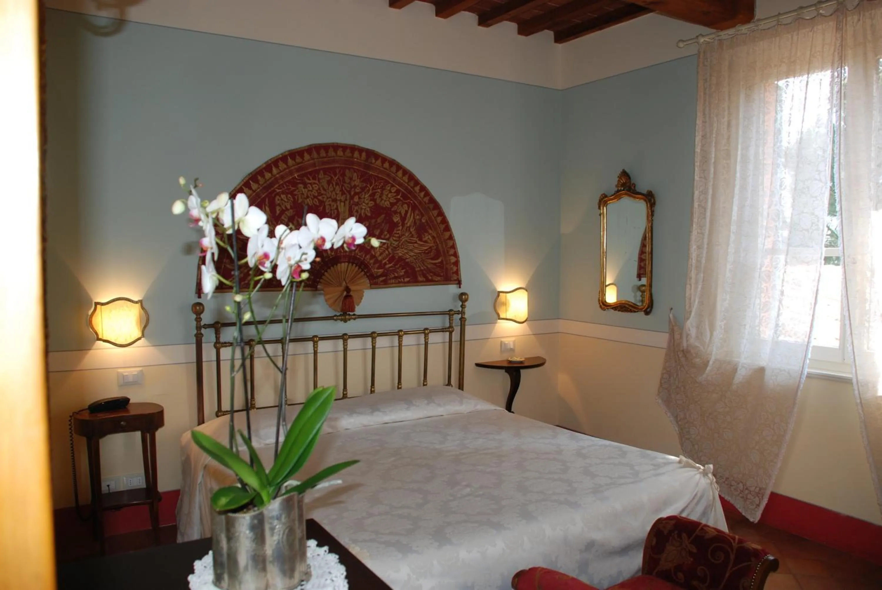 Bedroom in Il Rondò Boutique Hotel